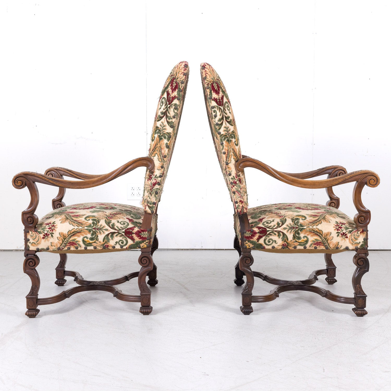 Pair of 19th Century French Louis XIV Style Carved Walnut Fauteuils