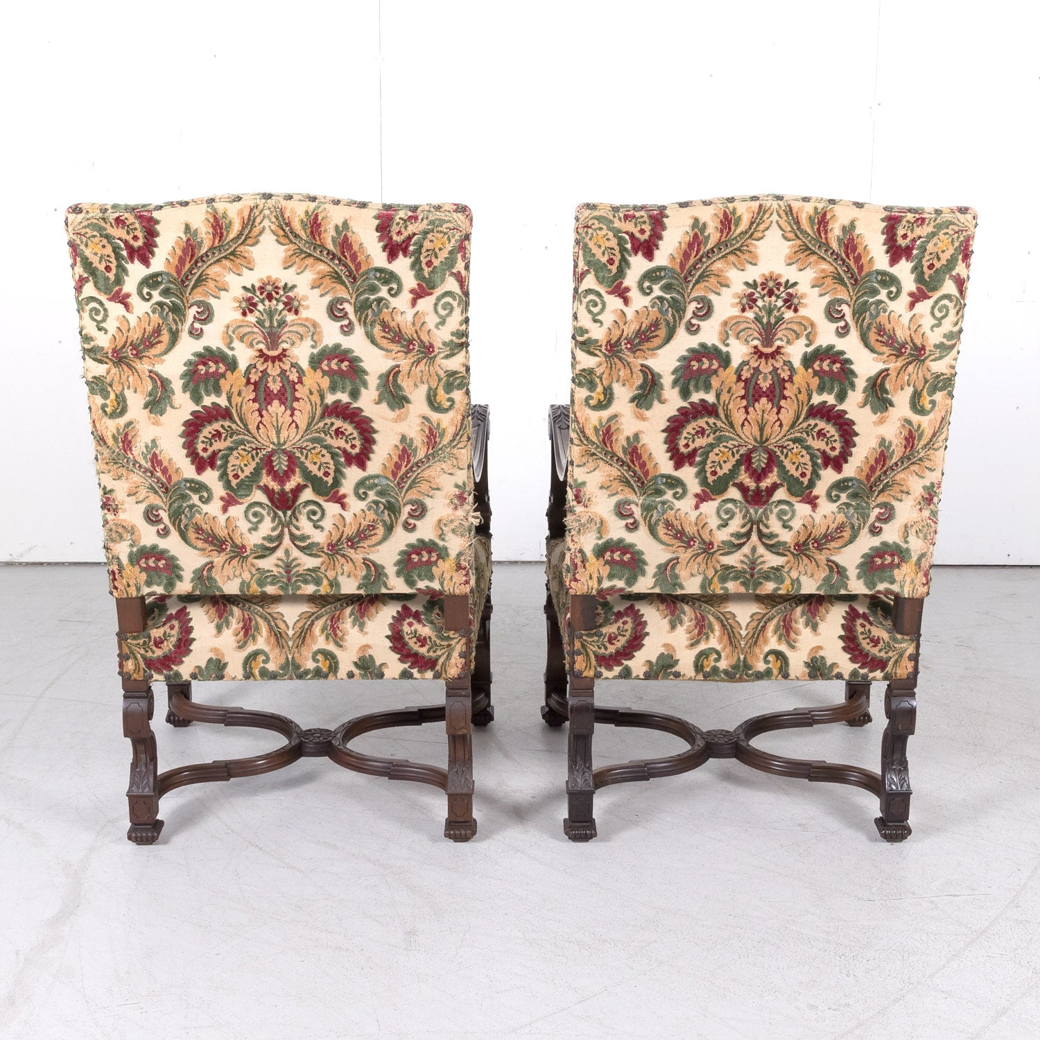 Pair of 19th Century French Louis XIV Style Carved Walnut Fauteuils