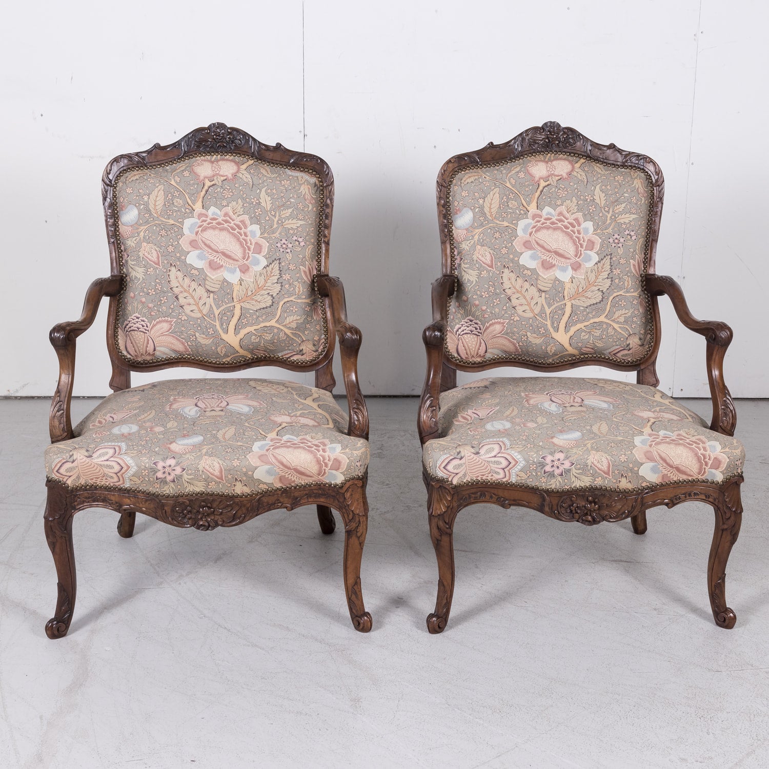 Fine Pair of 18th Century French Louis XV Period Carved Walnut Fauteuils