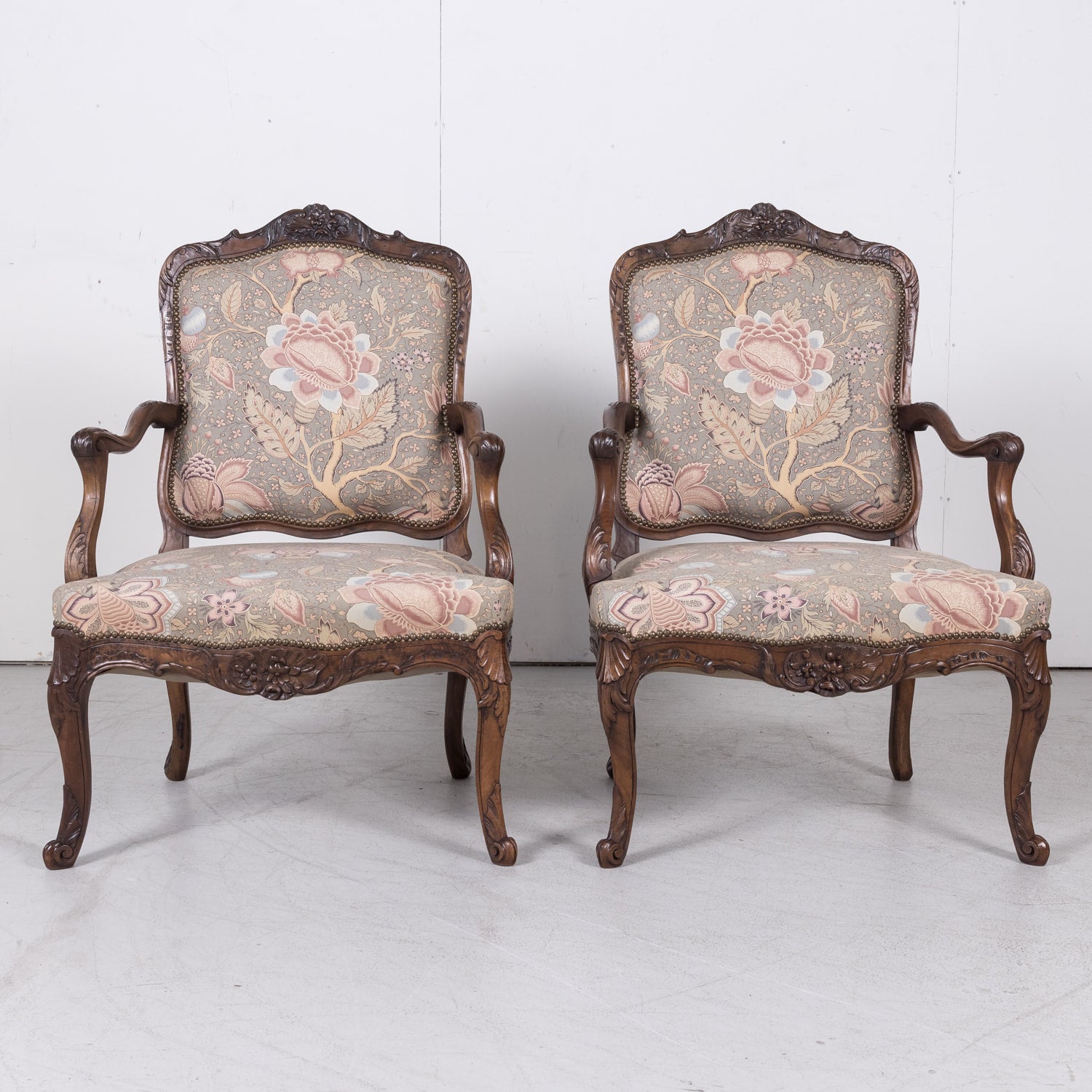 Fine Pair of 18th Century French Louis XV Period Carved Walnut Fauteuils