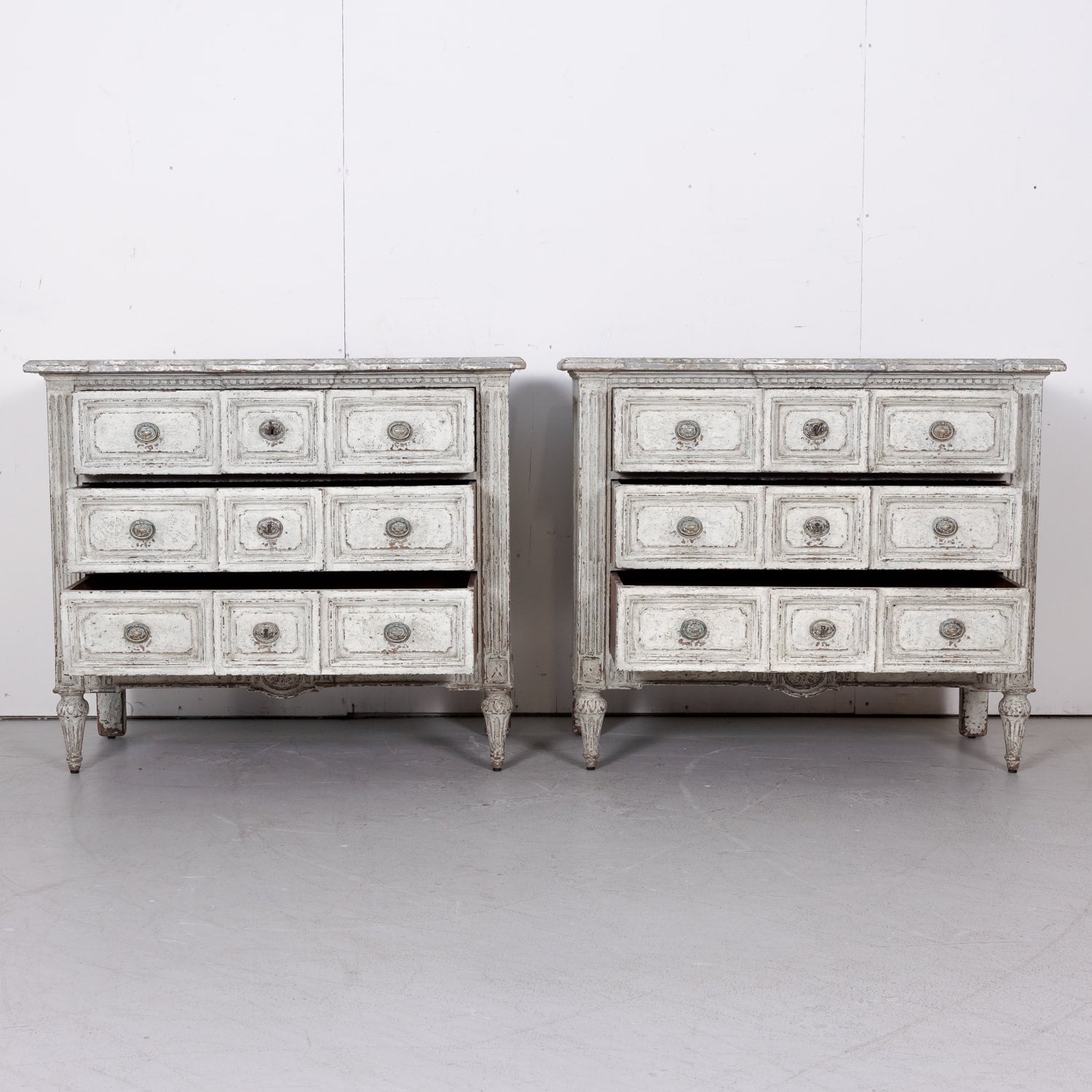 Pair of 18th Century French Louis XVI Period Painted Commodes with Faux Marble Tops