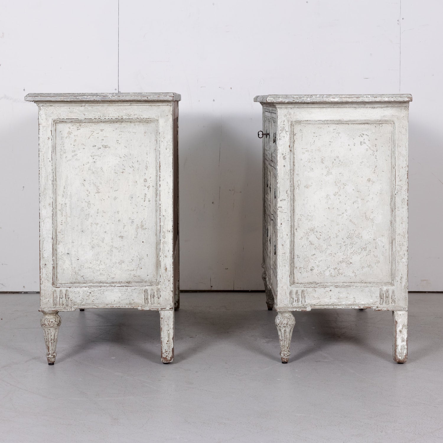 Pair of 18th Century French Louis XVI Period Painted Commodes with Faux Marble Tops