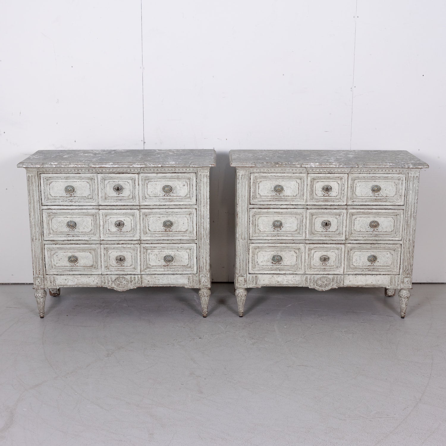 Pair of 18th Century French Louis XVI Period Painted Commodes with Faux Marble Tops