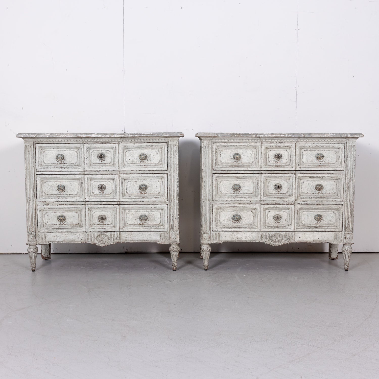 Pair of 18th Century French Louis XVI Period Painted Commodes with Faux Marble Tops