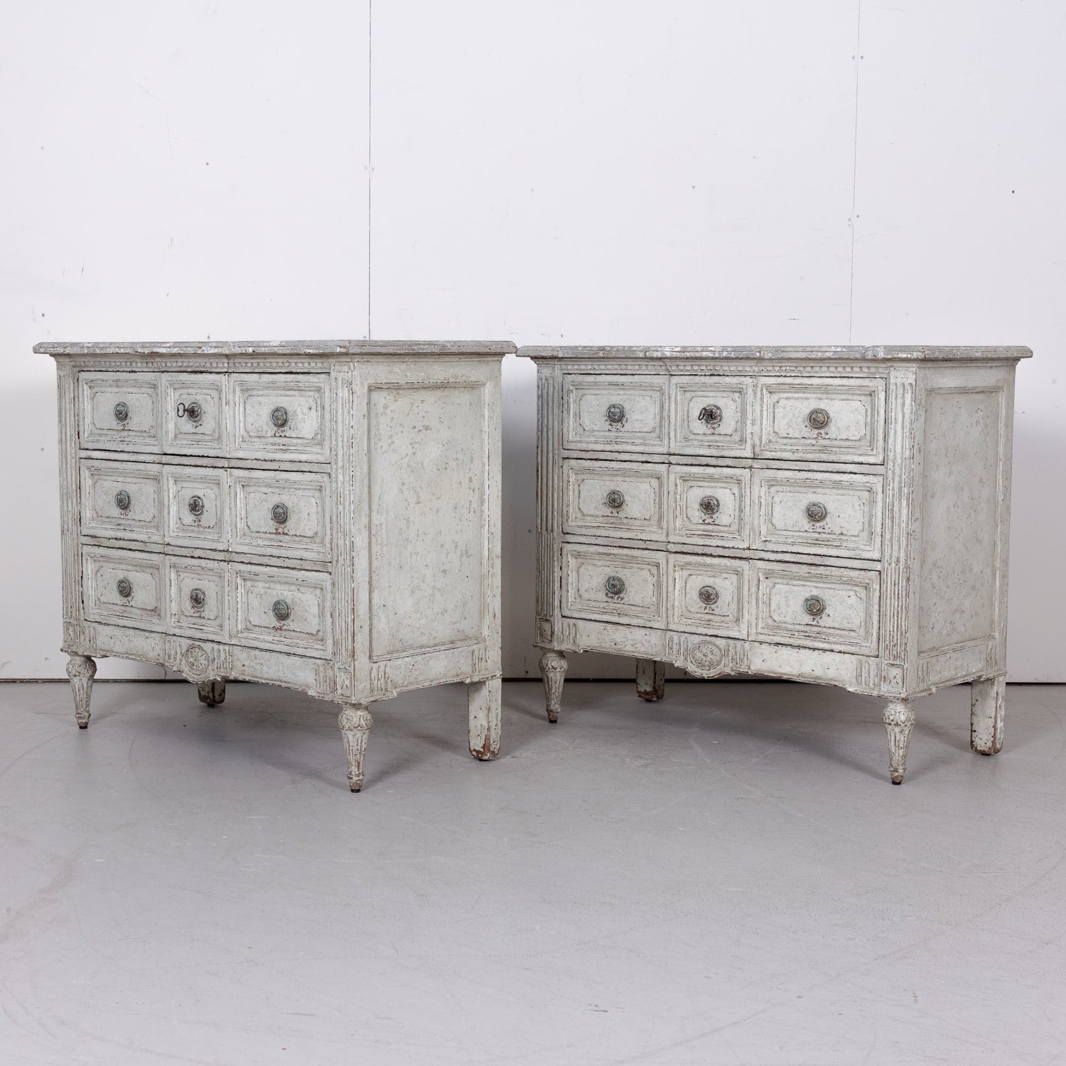 Pair of 18th Century French Louis XVI Period Painted Commodes with Faux Marble Tops