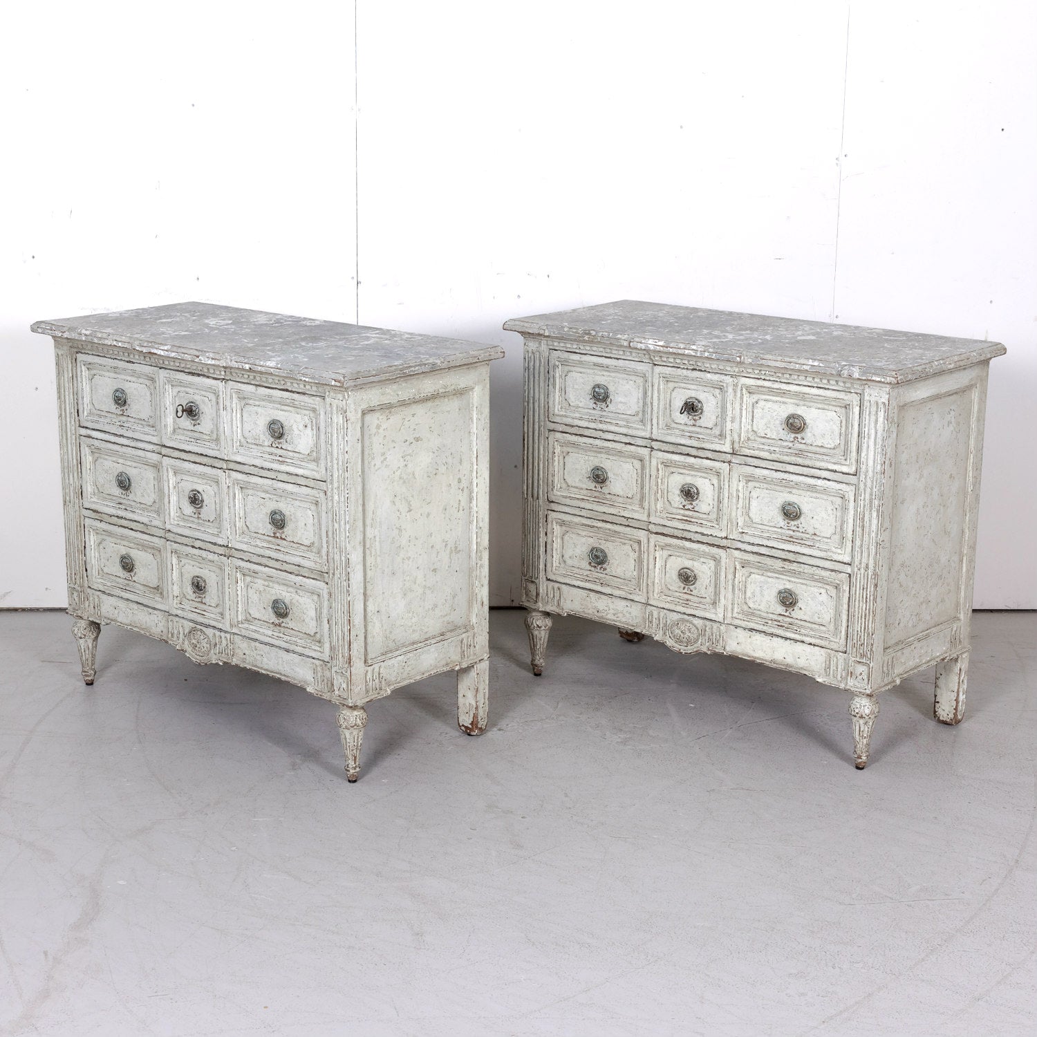 Pair of 18th Century French Louis XVI Period Painted Commodes with Faux Marble Tops