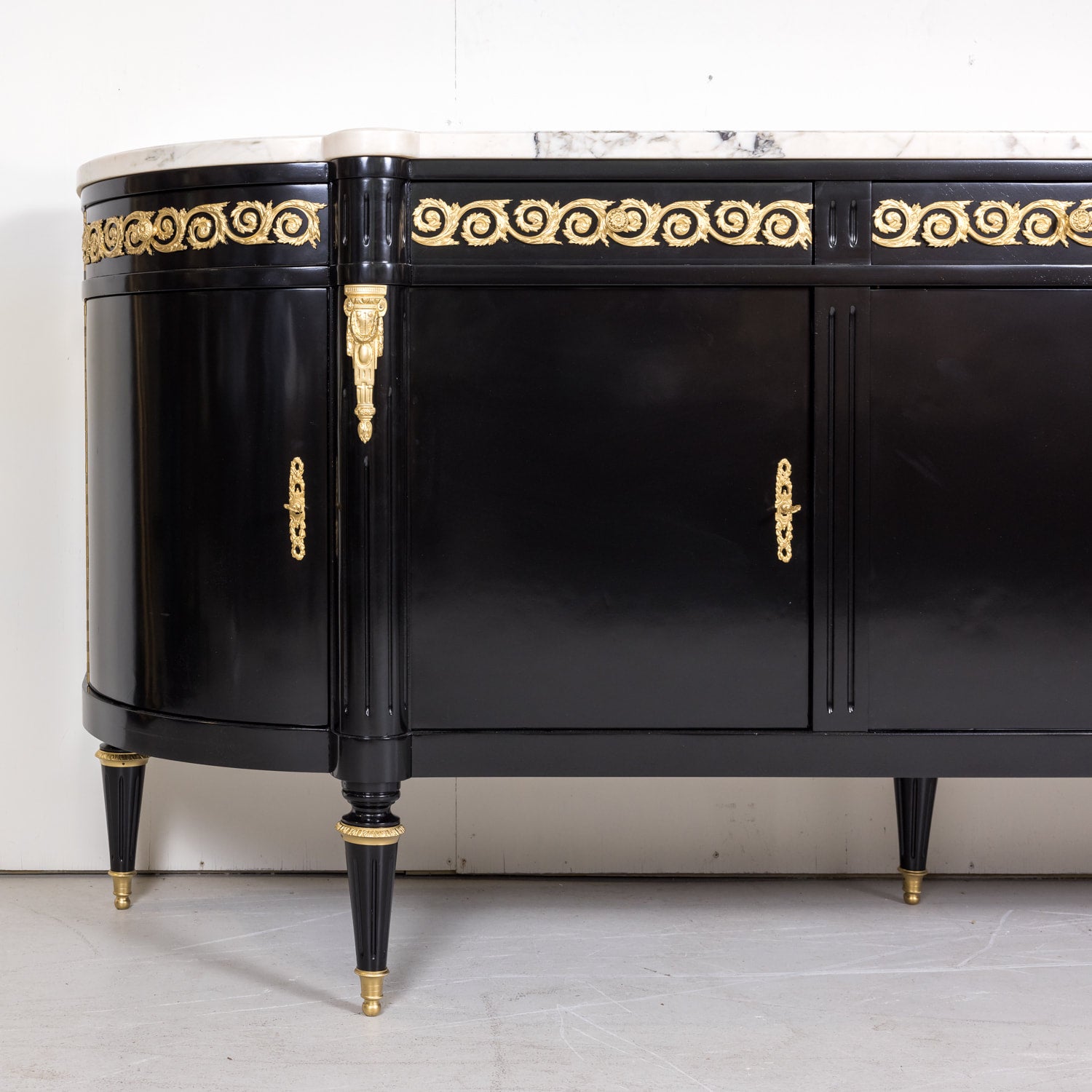 Exceptional French Louis XVI Style Ebonized Enfilade Buffet with Carrara Marble Top Attributed to Maison Mercier Freres 