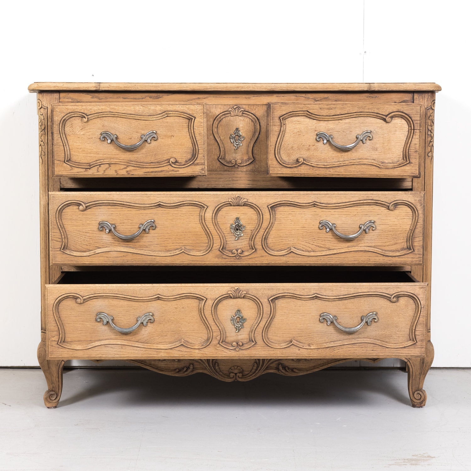 Antique French Country Louis XV Style Carved Bleached Oak Four-Drawer Commode