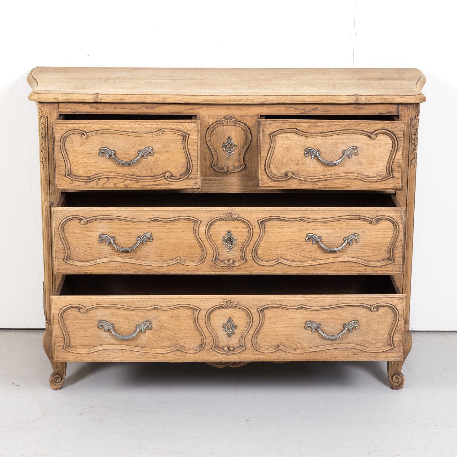 Antique French Country Louis XV Style Carved Bleached Oak Four-Drawer Commode