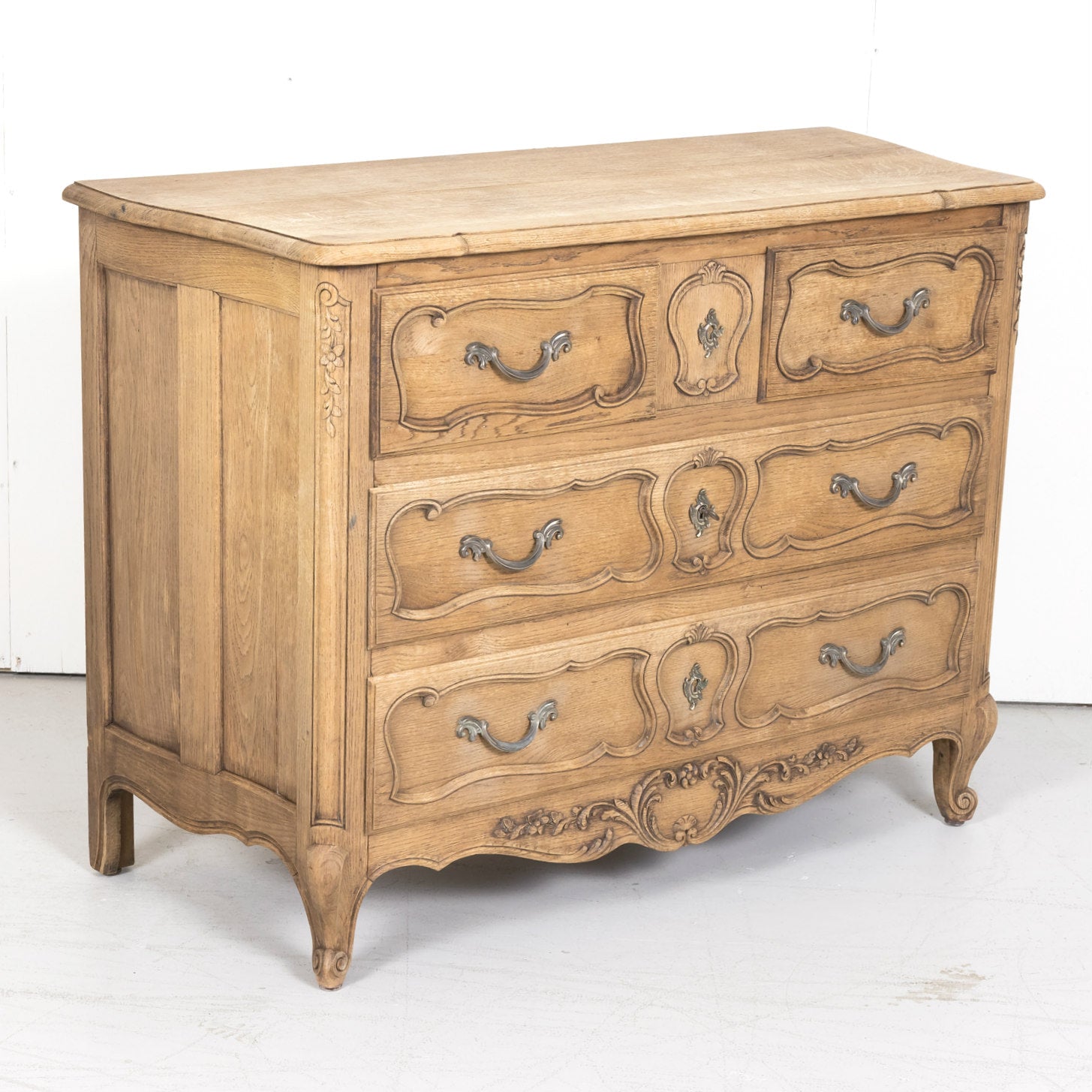 Antique French Country Louis XV Style Carved Bleached Oak Four-Drawer Commode