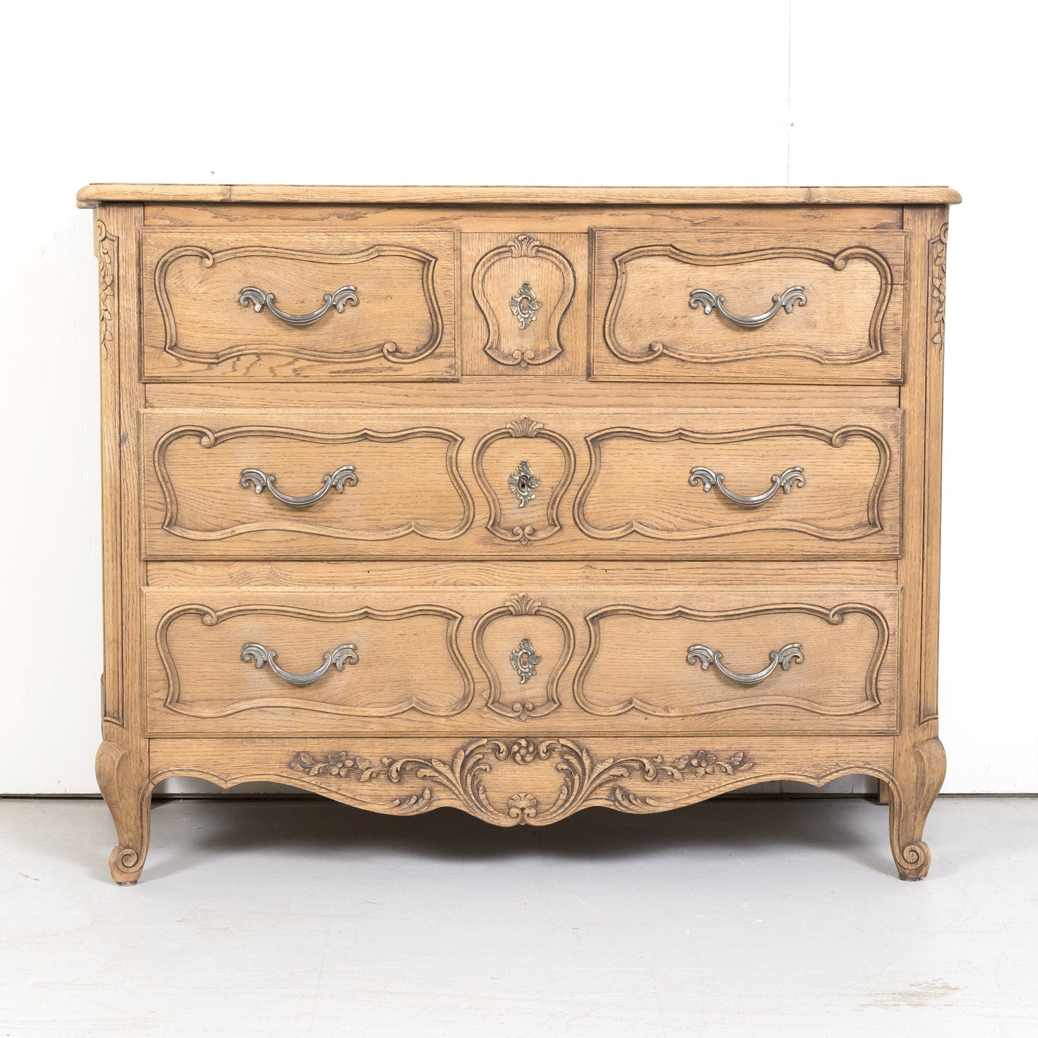 Antique French Country Louis XV Style Carved Bleached Oak Four-Drawer Commode