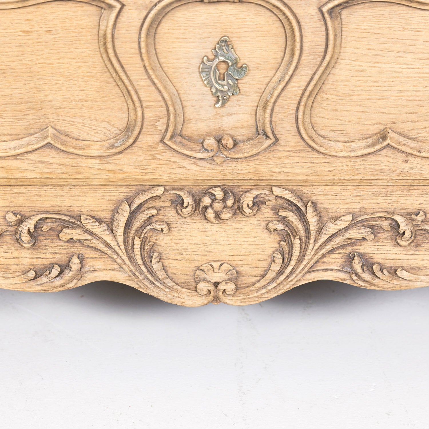 Antique French Country Louis XV Style Carved Bleached Oak Four-Drawer Commode