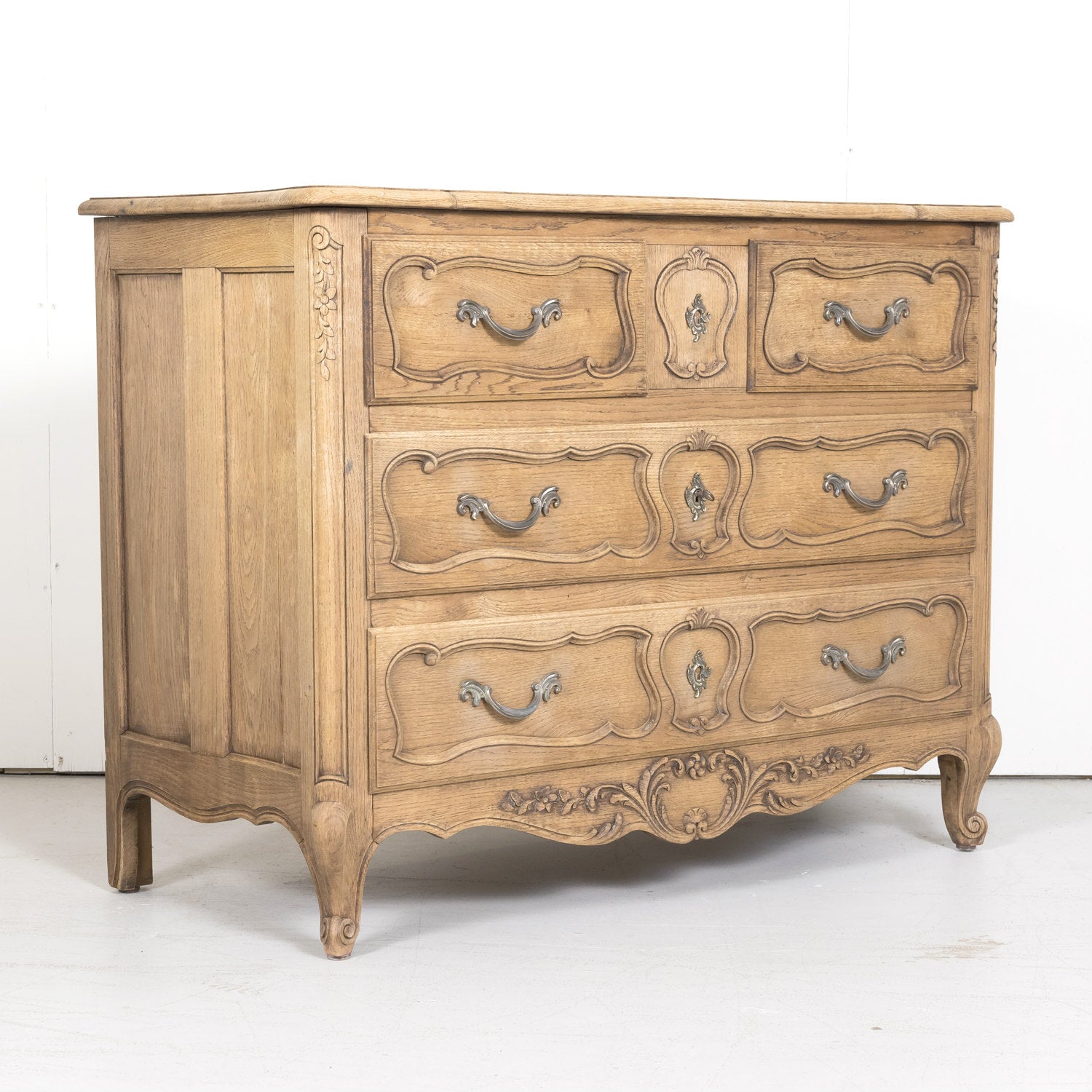 Antique French Country Louis XV Style Carved Bleached Oak Four-Drawer Commode