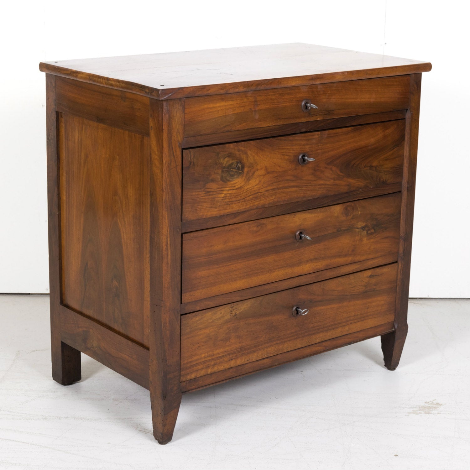 19th Century French Louis XVI Style Four-Drawer Walnut Commode