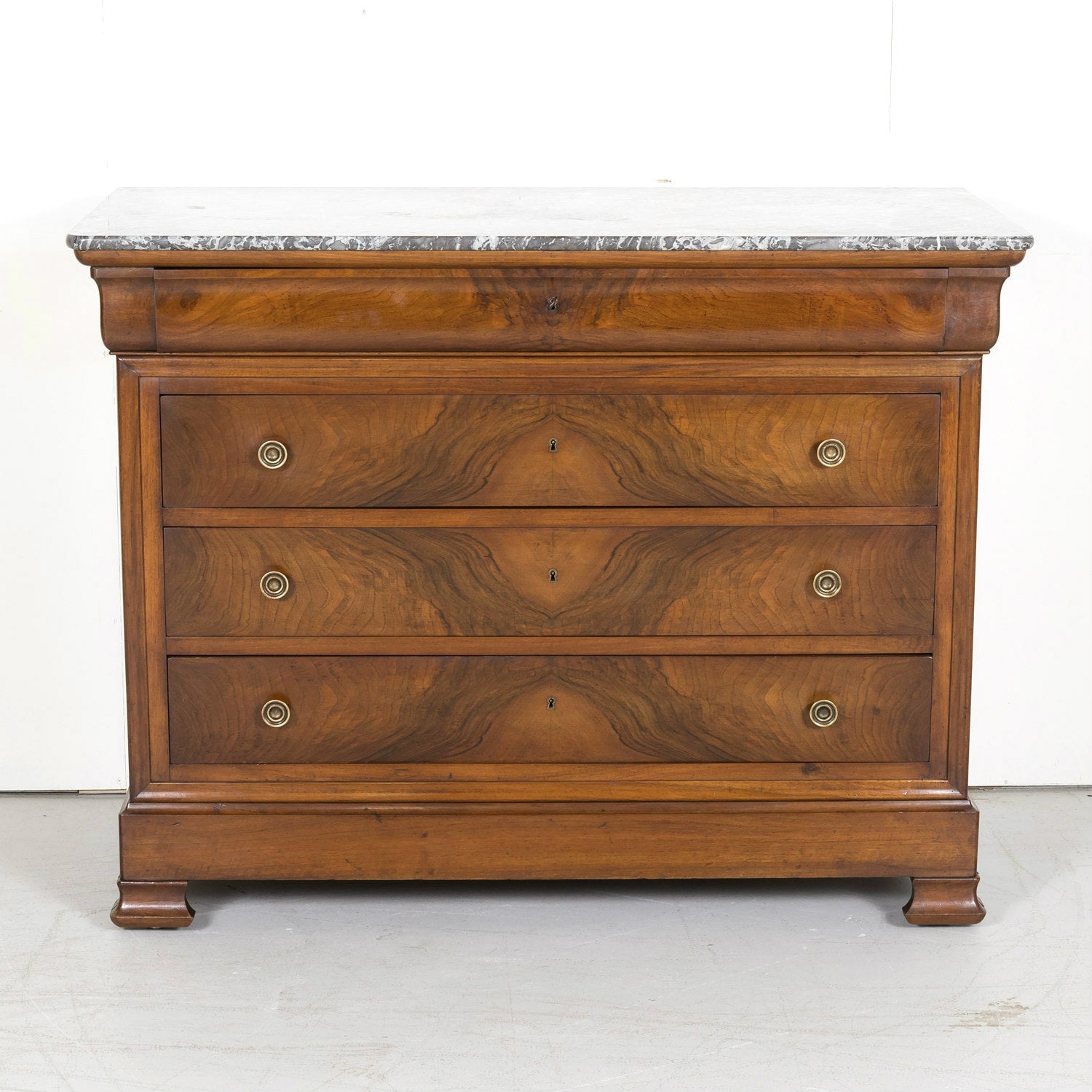 19th Century French Louis Philippe Period Walnut Commode with Bookmatched Front and Marble Top