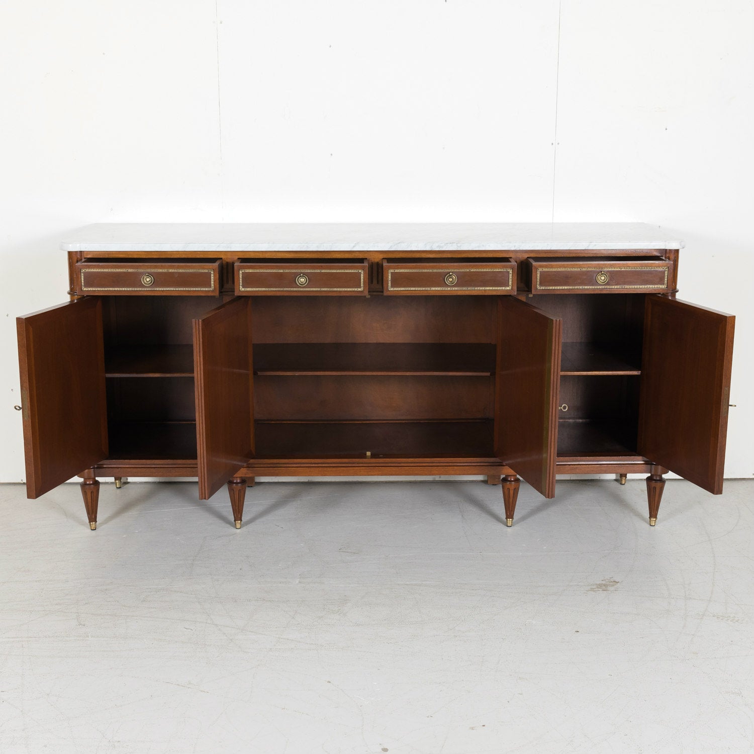 Early 20th Century French Louis XVI Style Mahogany Enfilade Buffet with White Carrara Marble Top