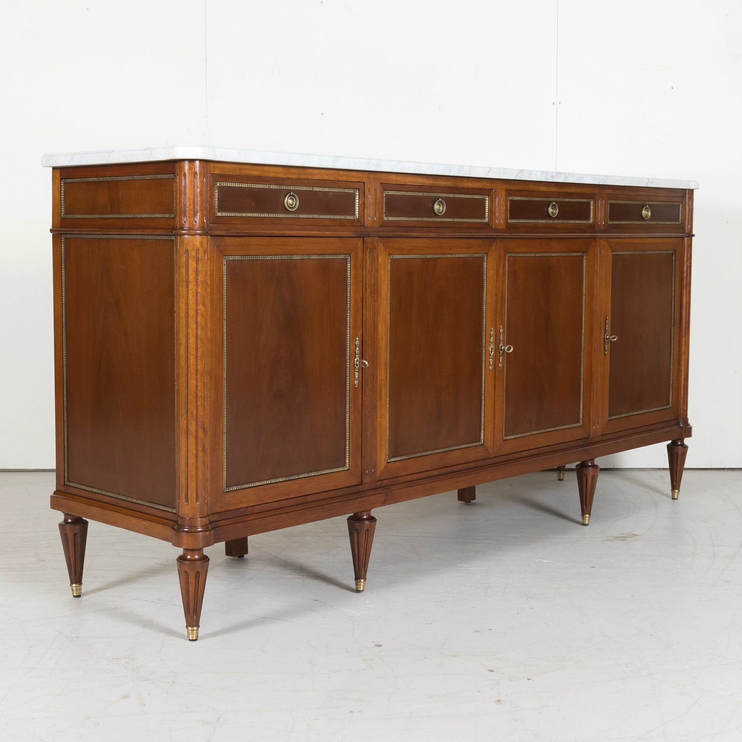 Early 20th Century French Louis XVI Style Mahogany Enfilade Buffet with White Carrara Marble Top