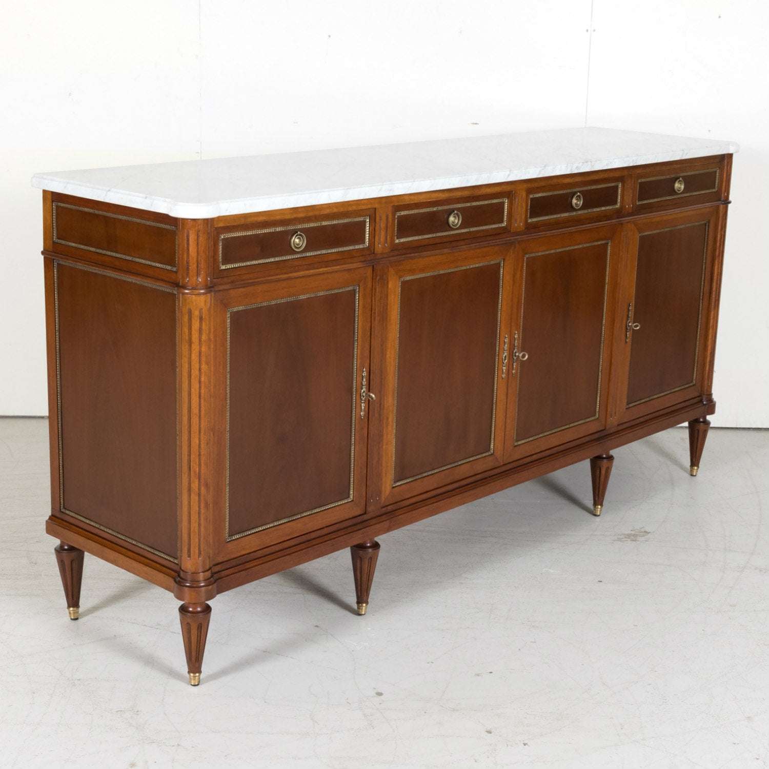 Early 20th Century French Louis XVI Style Mahogany Enfilade Buffet with White Carrara Marble Top