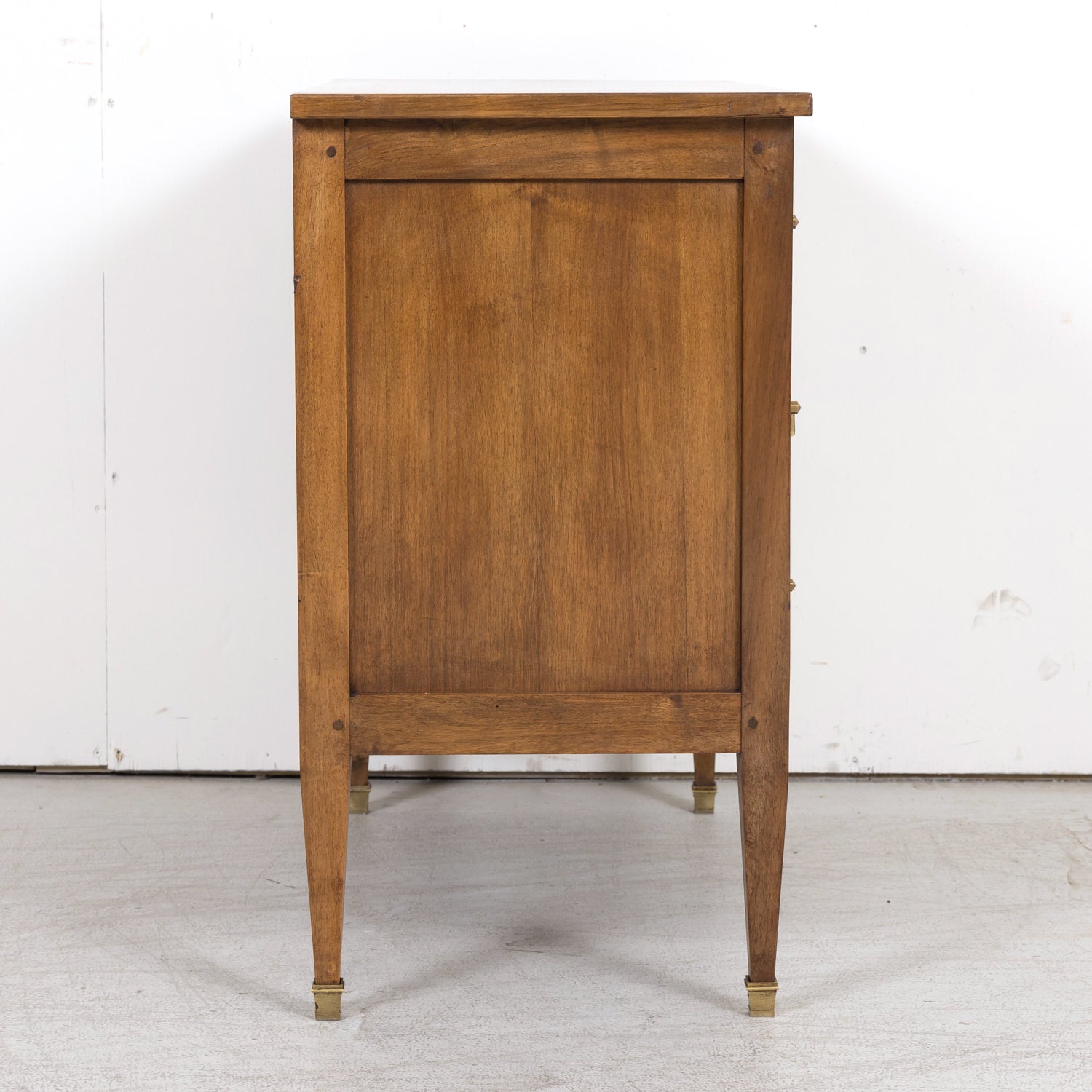 Late 19th Century French Louis XVI Style Petite Walnut Commode with Marquetry Band on Top