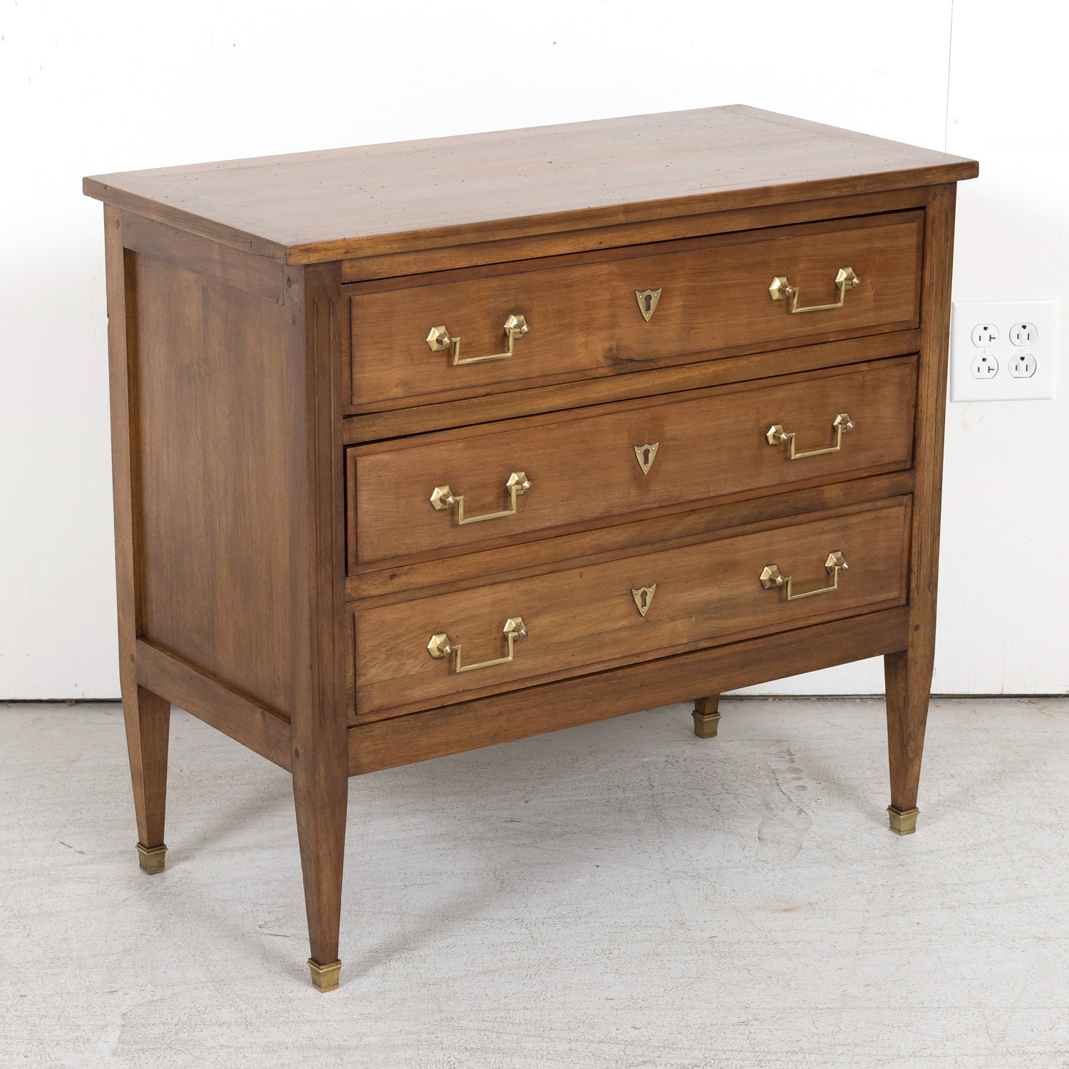 Late 19th Century French Louis XVI Style Petite Walnut Commode with Marquetry Band on Top