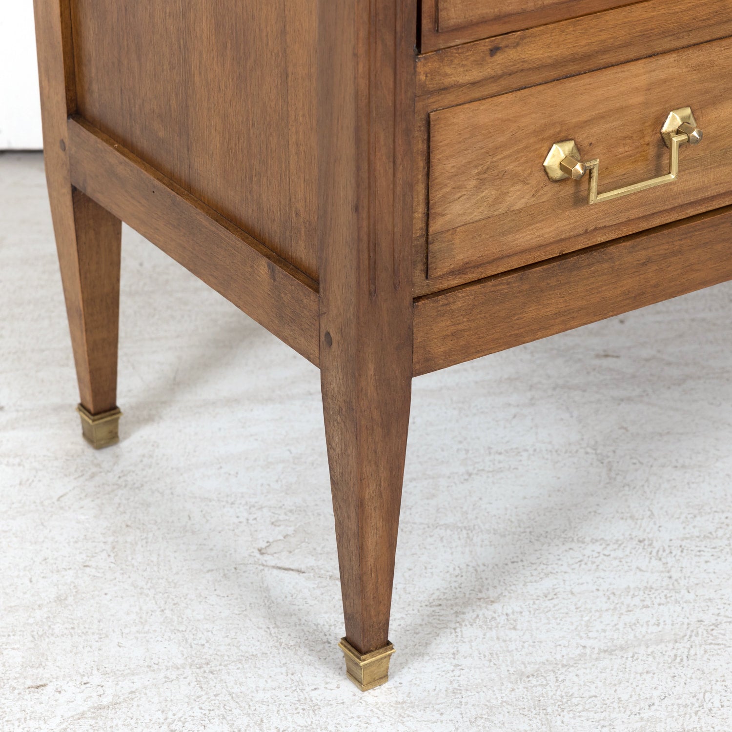 Late 19th Century French Louis XVI Style Petite Walnut Commode with Marquetry Band on Top