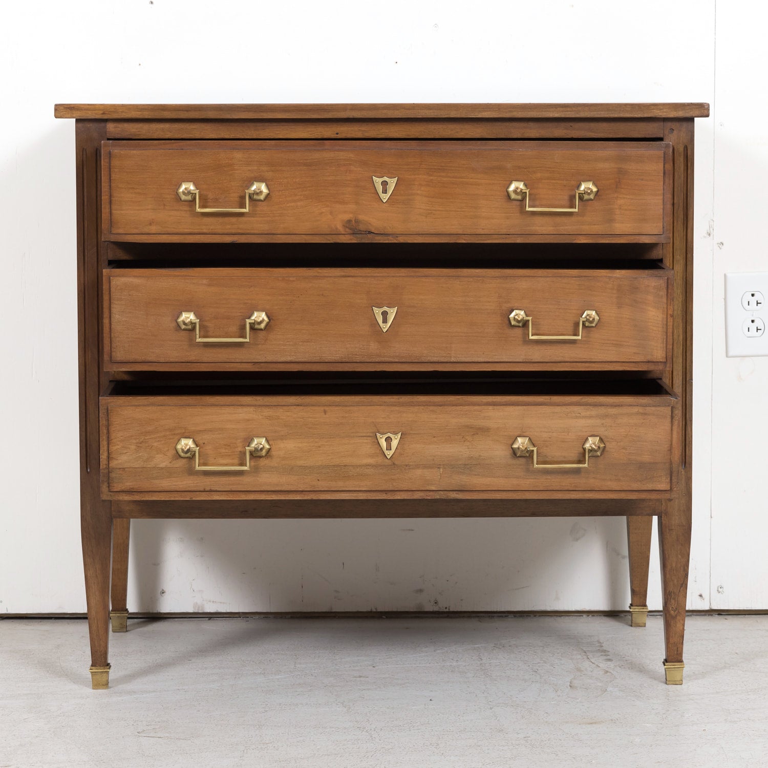 Late 19th Century French Louis XVI Style Petite Walnut Commode with Marquetry Band on Top
