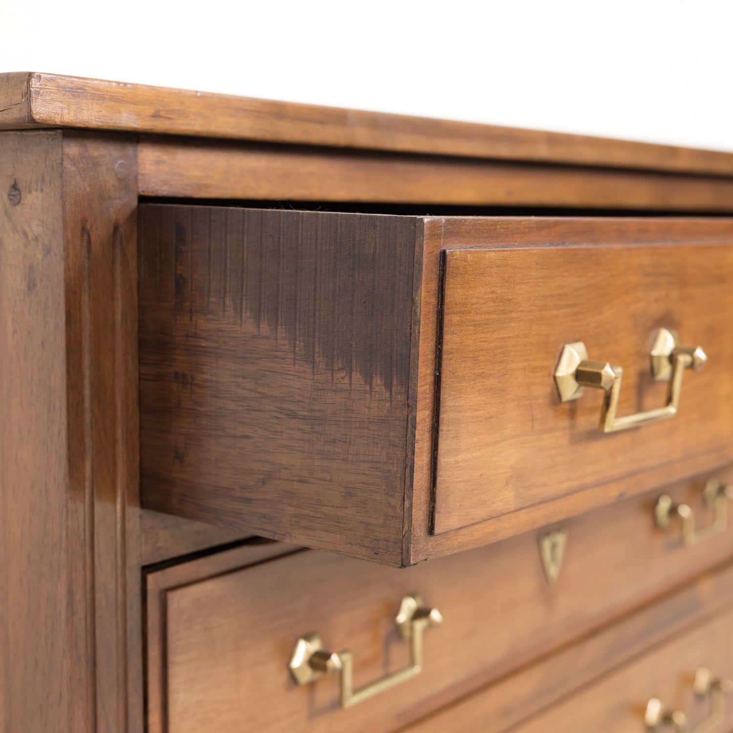Late 19th Century French Louis XVI Style Petite Walnut Commode with Marquetry Band on Top