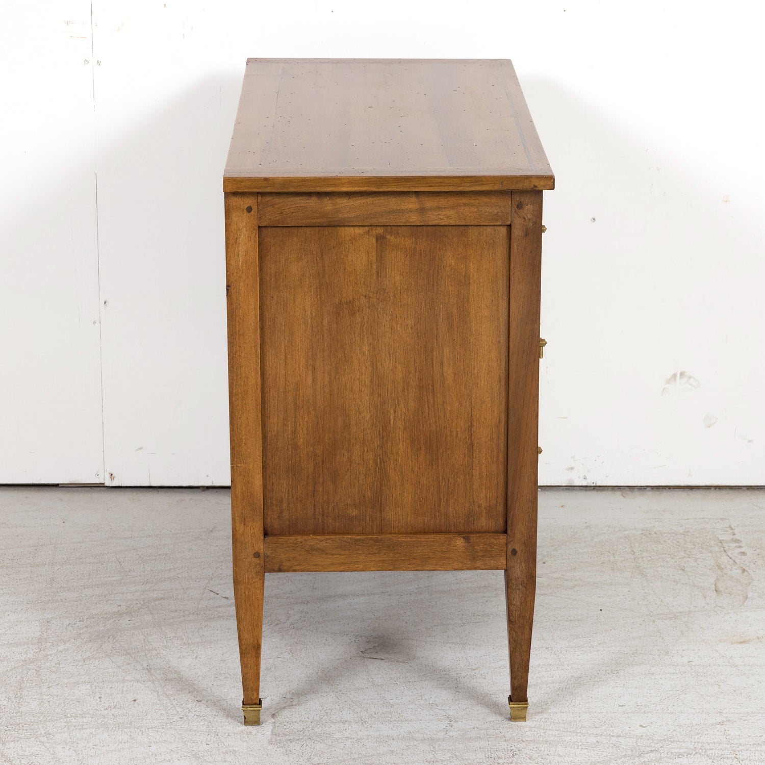 Late 19th Century French Louis XVI Style Petite Walnut Commode with Marquetry Band on Top