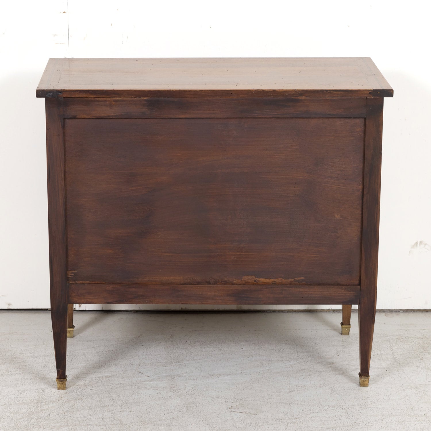 Late 19th Century French Louis XVI Style Petite Walnut Commode with Marquetry Band on Top
