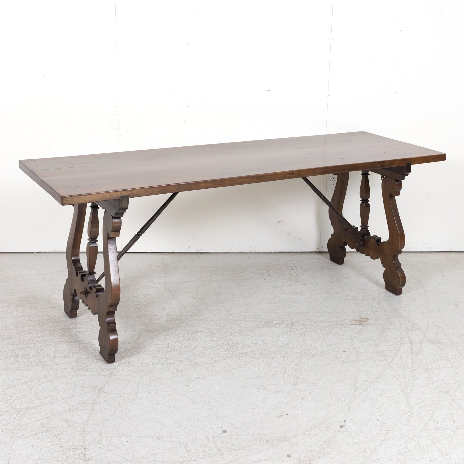 19th Century Spanish Baroque Style Walnut Trestle Dining Table with Iron Stretchers