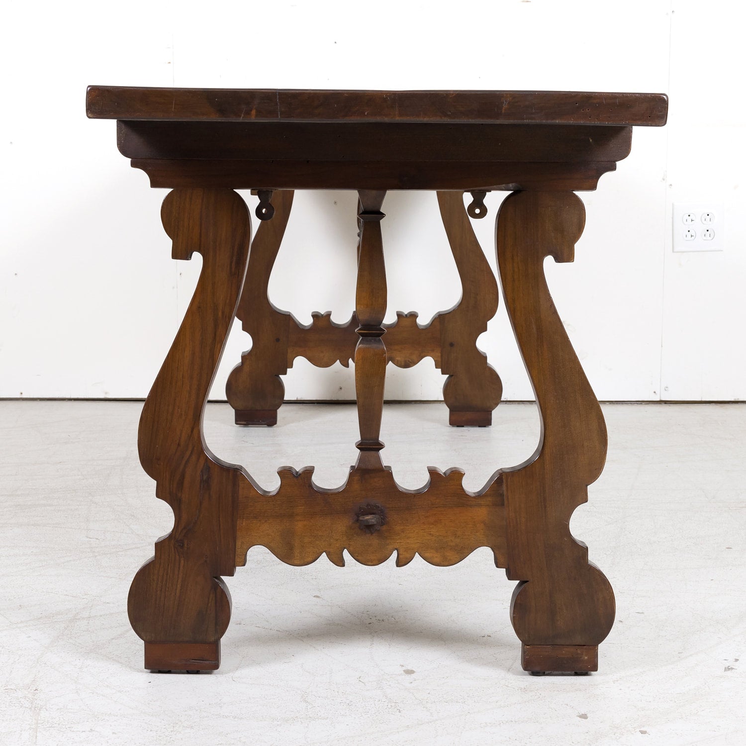 19th Century Spanish Baroque Style Walnut Trestle Dining Table with Iron Stretchers