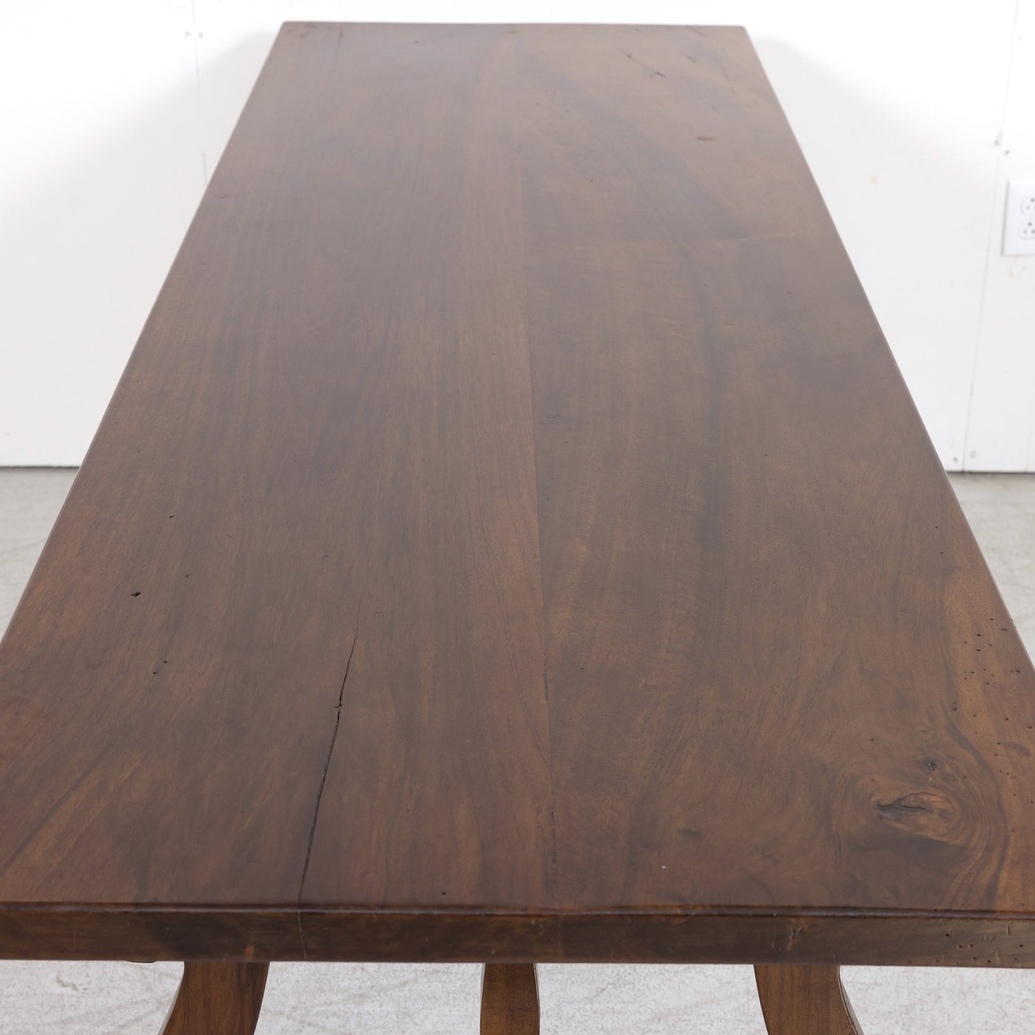 19th Century Spanish Baroque Style Walnut Trestle Dining Table with Iron Stretchers