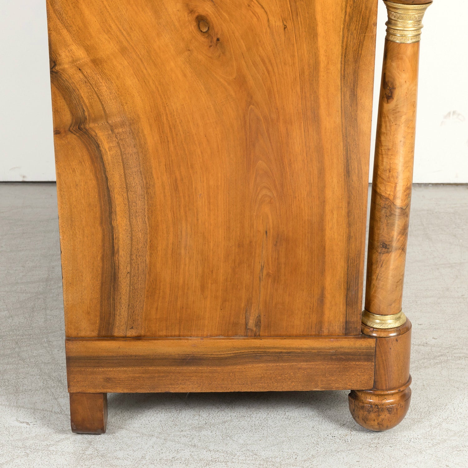 19th Century French Empire Period Walnut and Bookmatched Flaming Walnut Commode with Marble Top