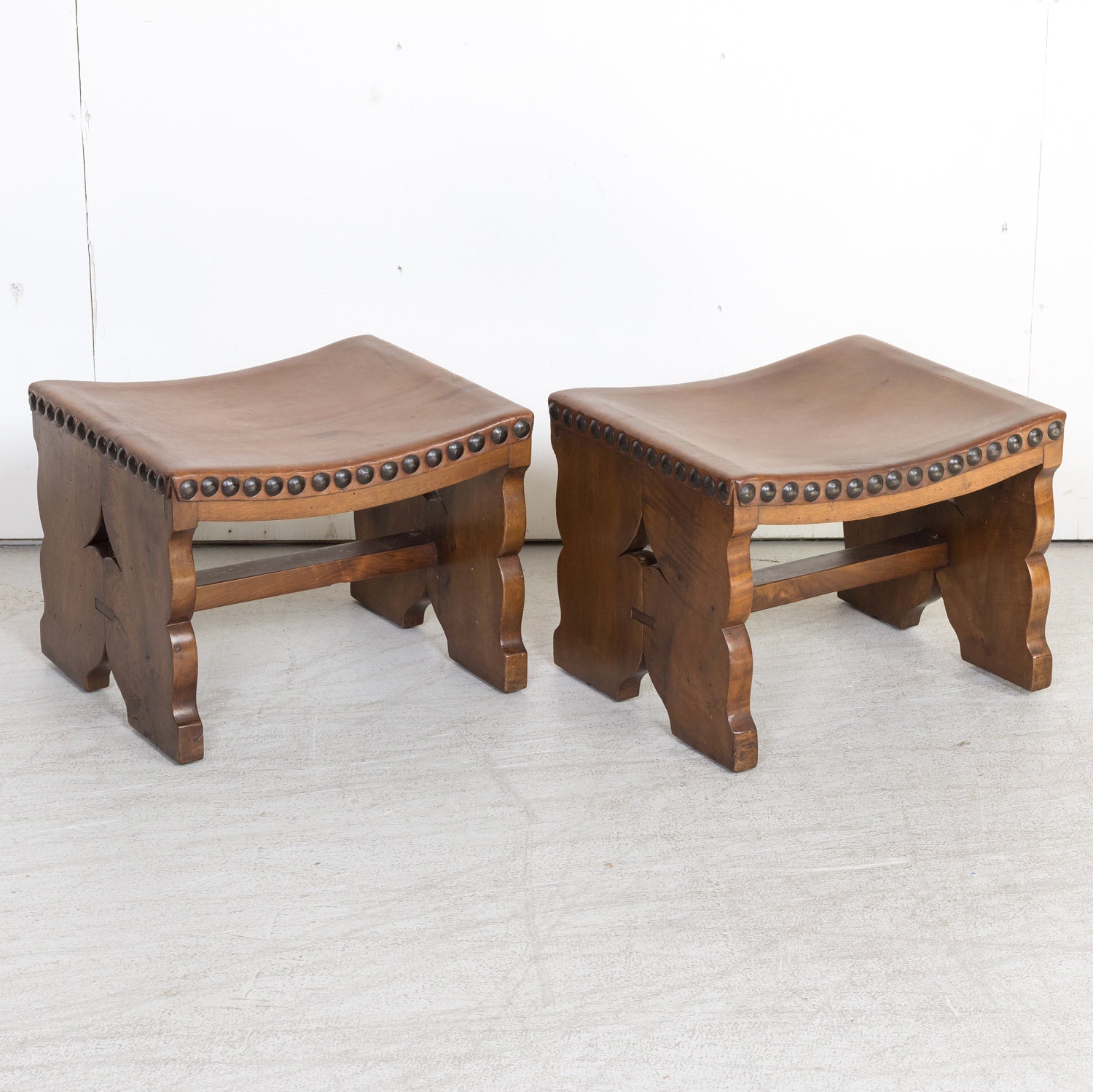 Pair of 19th Century Spanish Carved Walnut and Leather Footstools