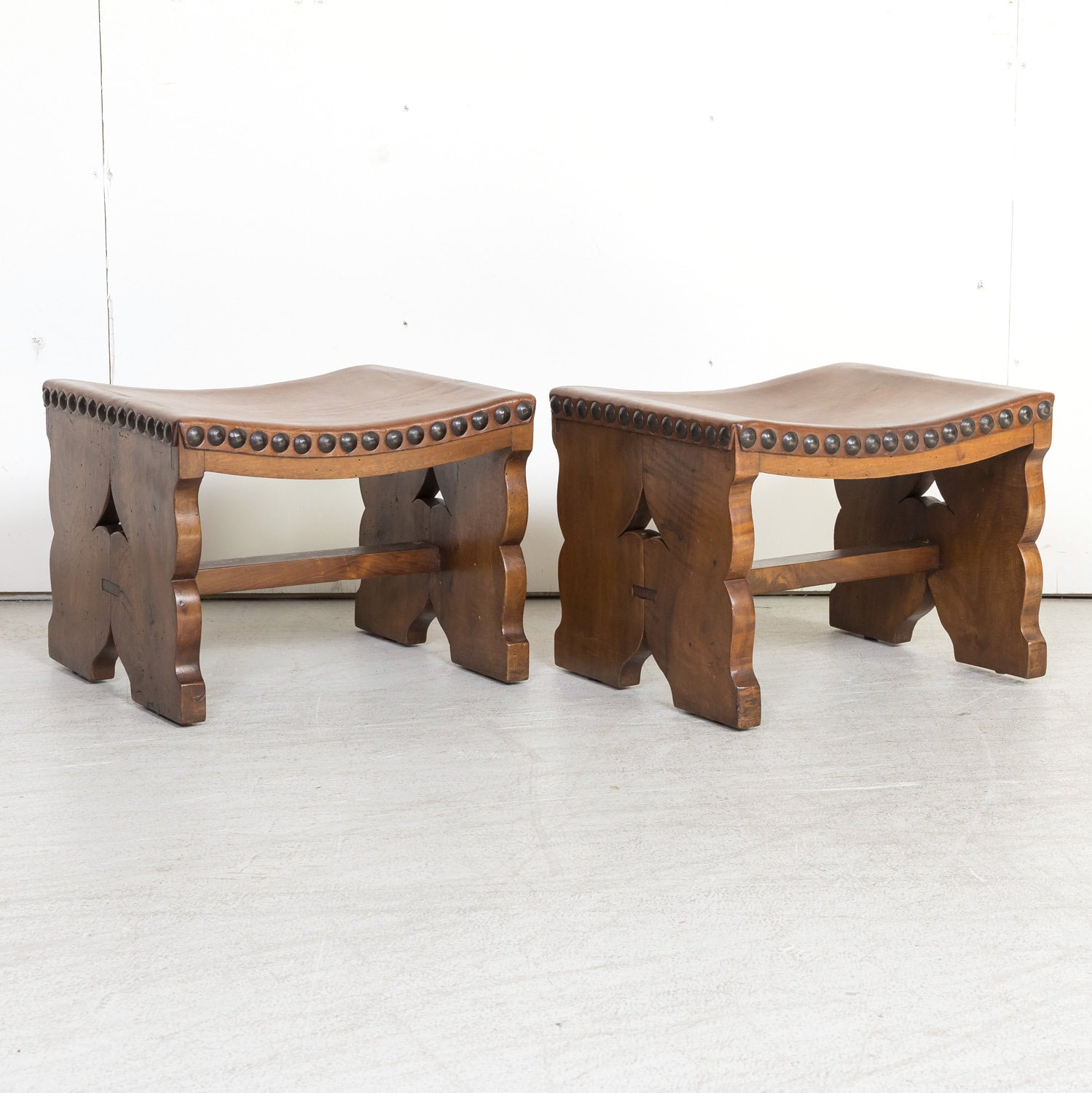 Pair of 19th Century Spanish Carved Walnut and Leather Footstools