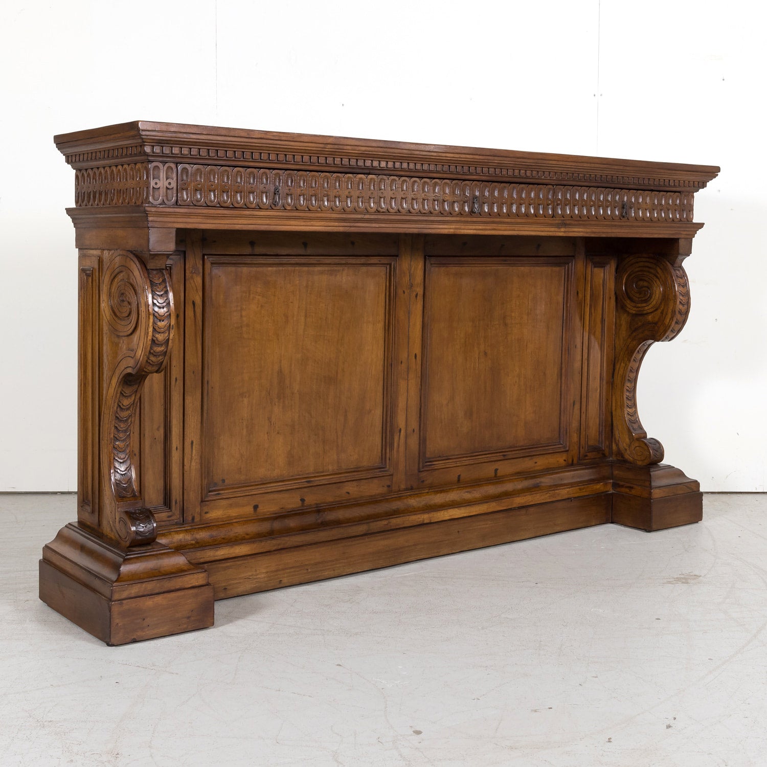 19th Century Spanish Renaissance Style Carved Walnut Wall Console with Three Drawers