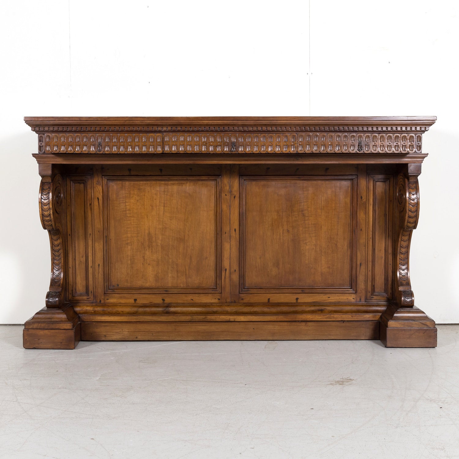 19th Century Spanish Renaissance Style Carved Walnut Wall Console with Three Drawers