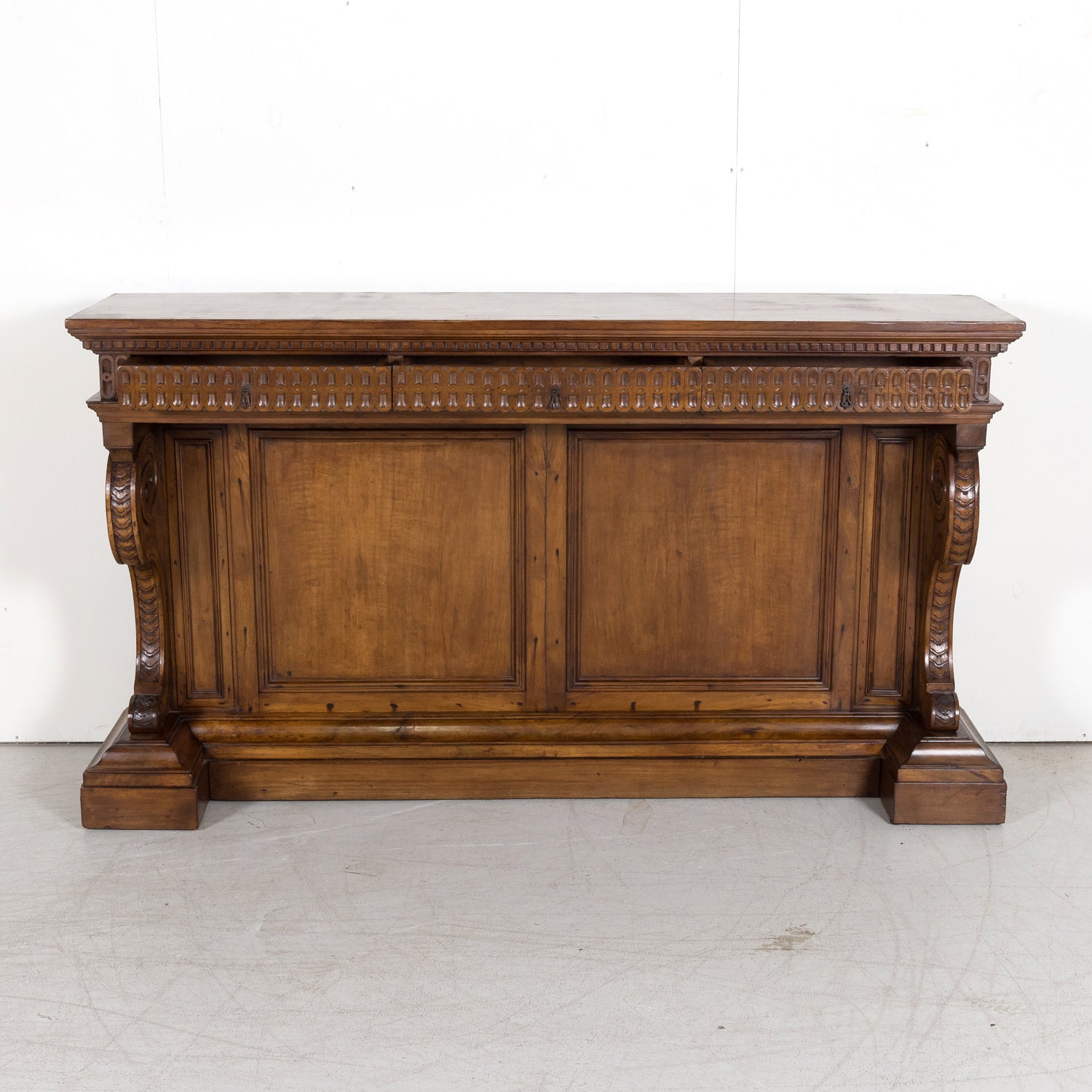 19th Century Spanish Renaissance Style Carved Walnut Wall Console with Three Drawers