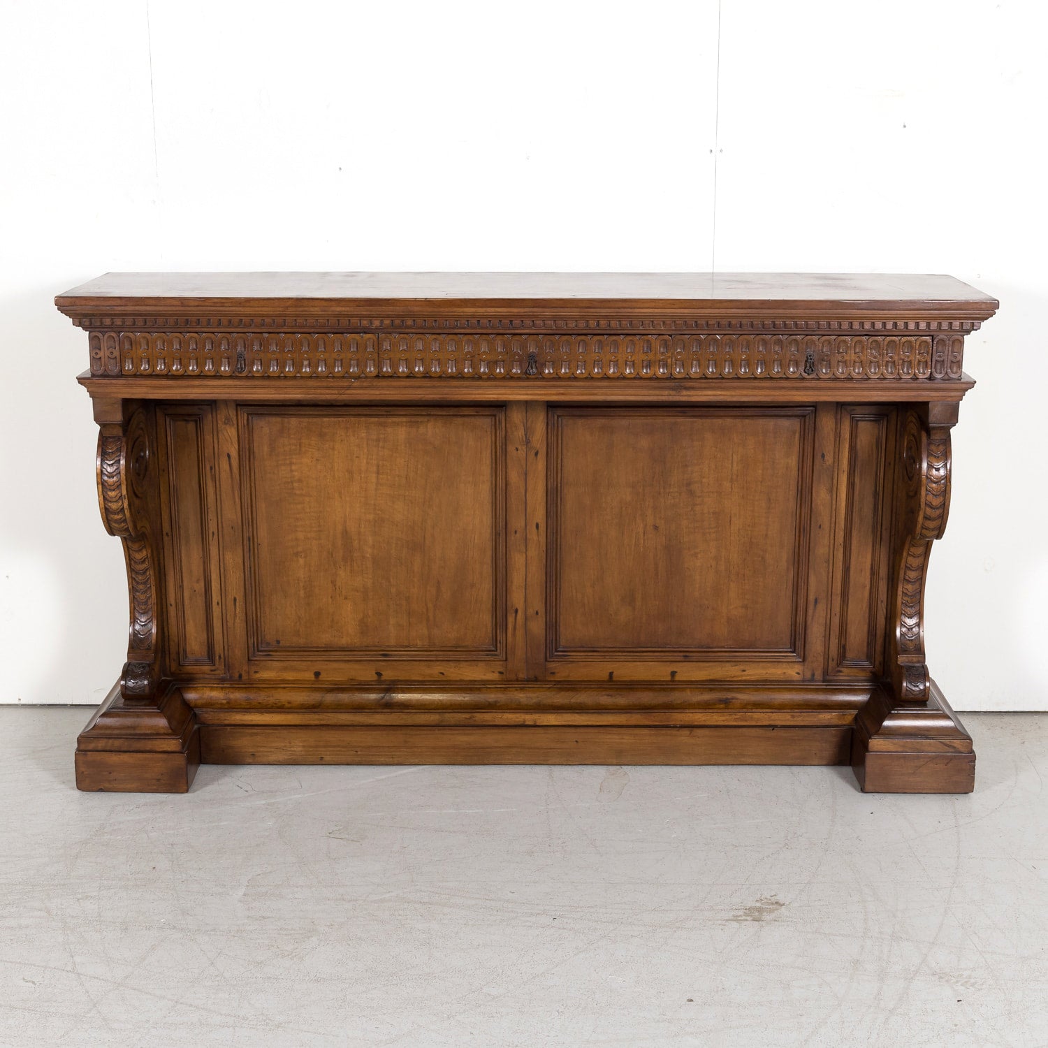 19th Century Spanish Renaissance Style Carved Walnut Wall Console with Three Drawers