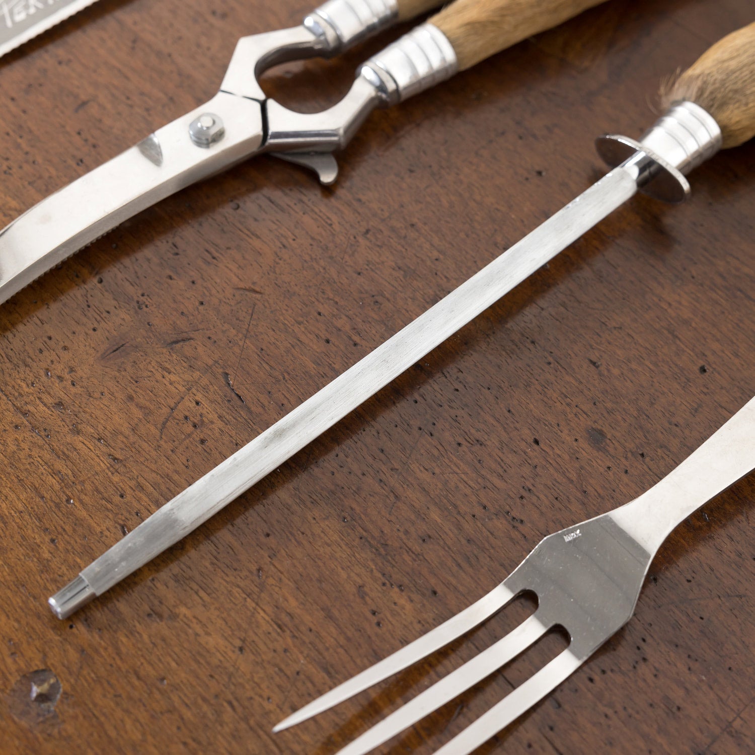 Vintage 4-Piece French Stainless Steel and Deer Hoof Carving Set