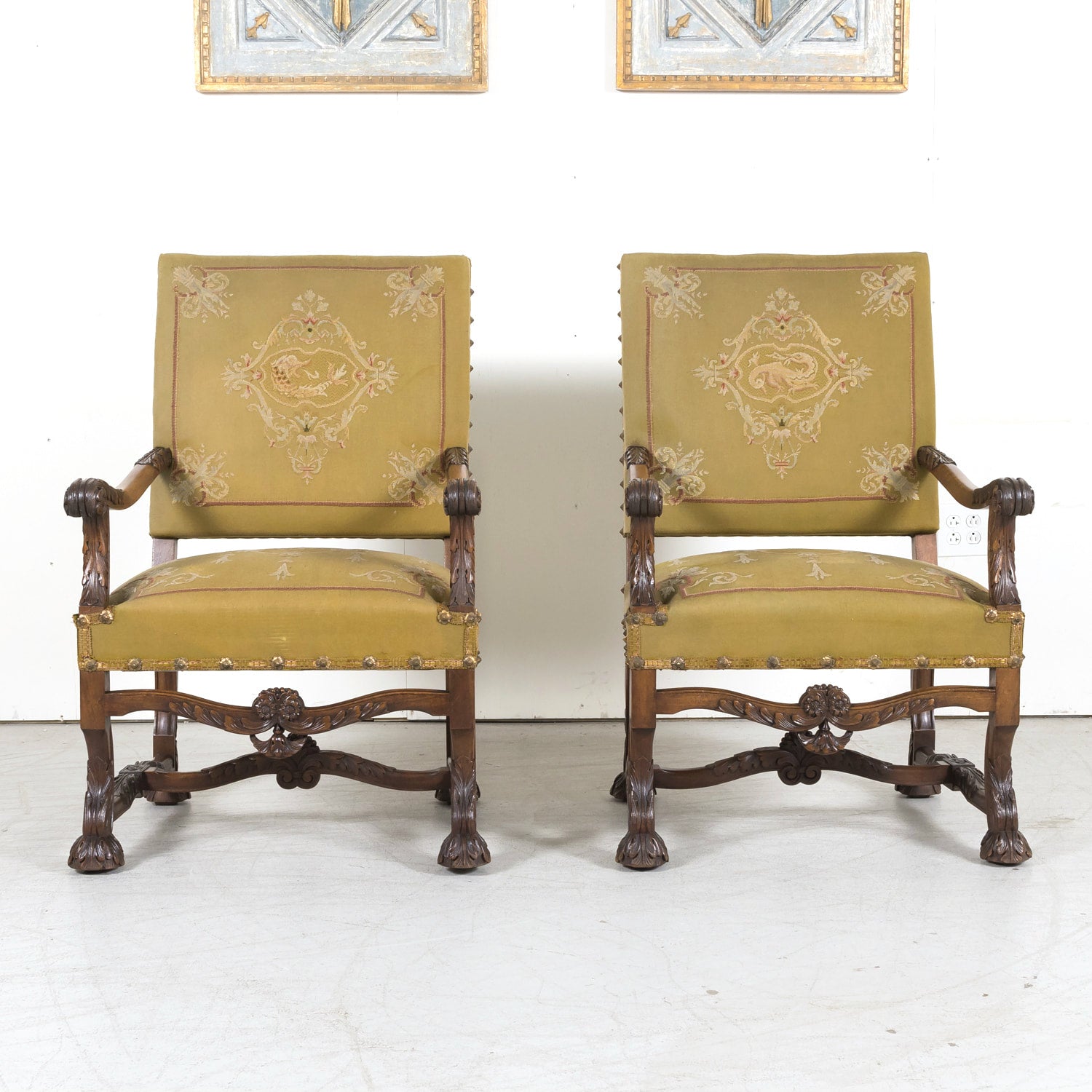 Pair of Early 19th Century French Louis XIV Style Carved Walnut Fauteuils or Armchairs
