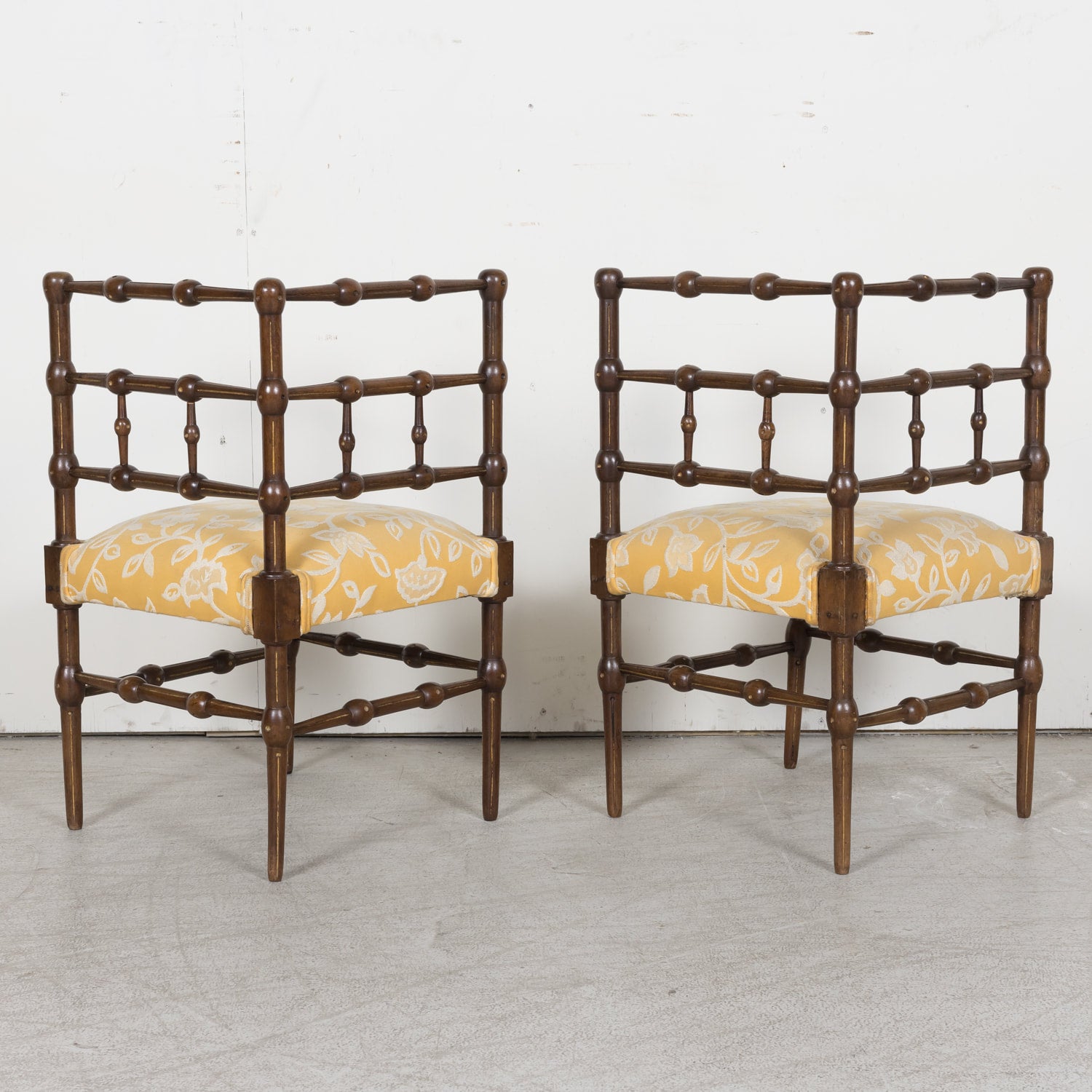 Pair of faux bamboo corner chairs from Normandie