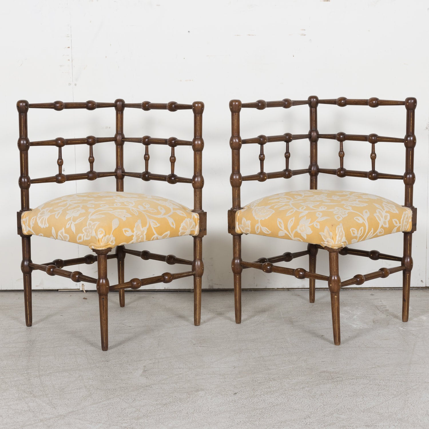 Pair of faux bamboo corner chairs from Normandie
