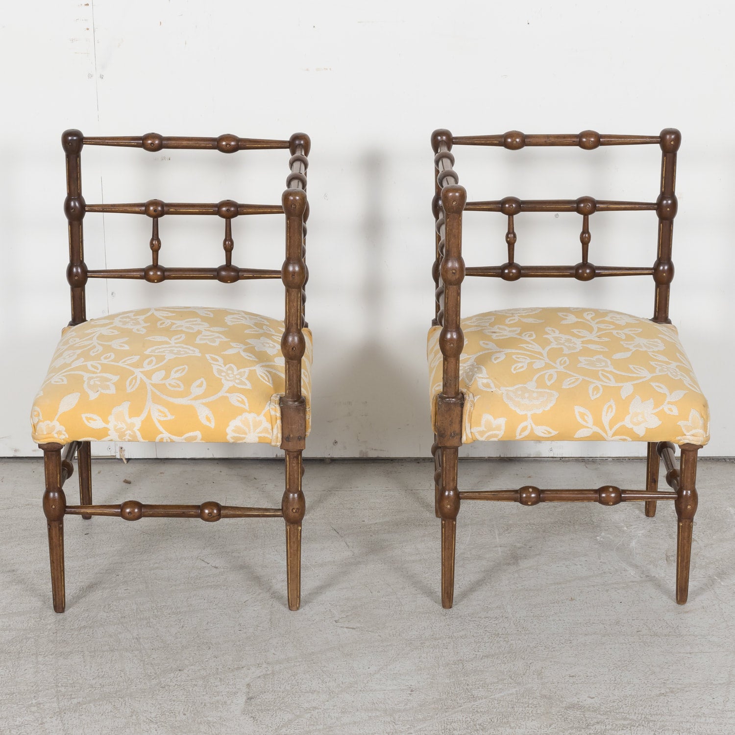 Pair of faux bamboo corner chairs from Normandie