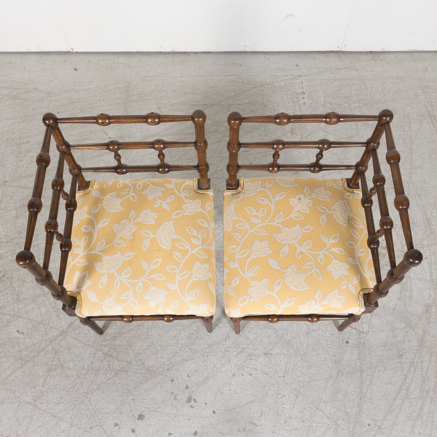 Pair of faux bamboo corner chairs from Normandie