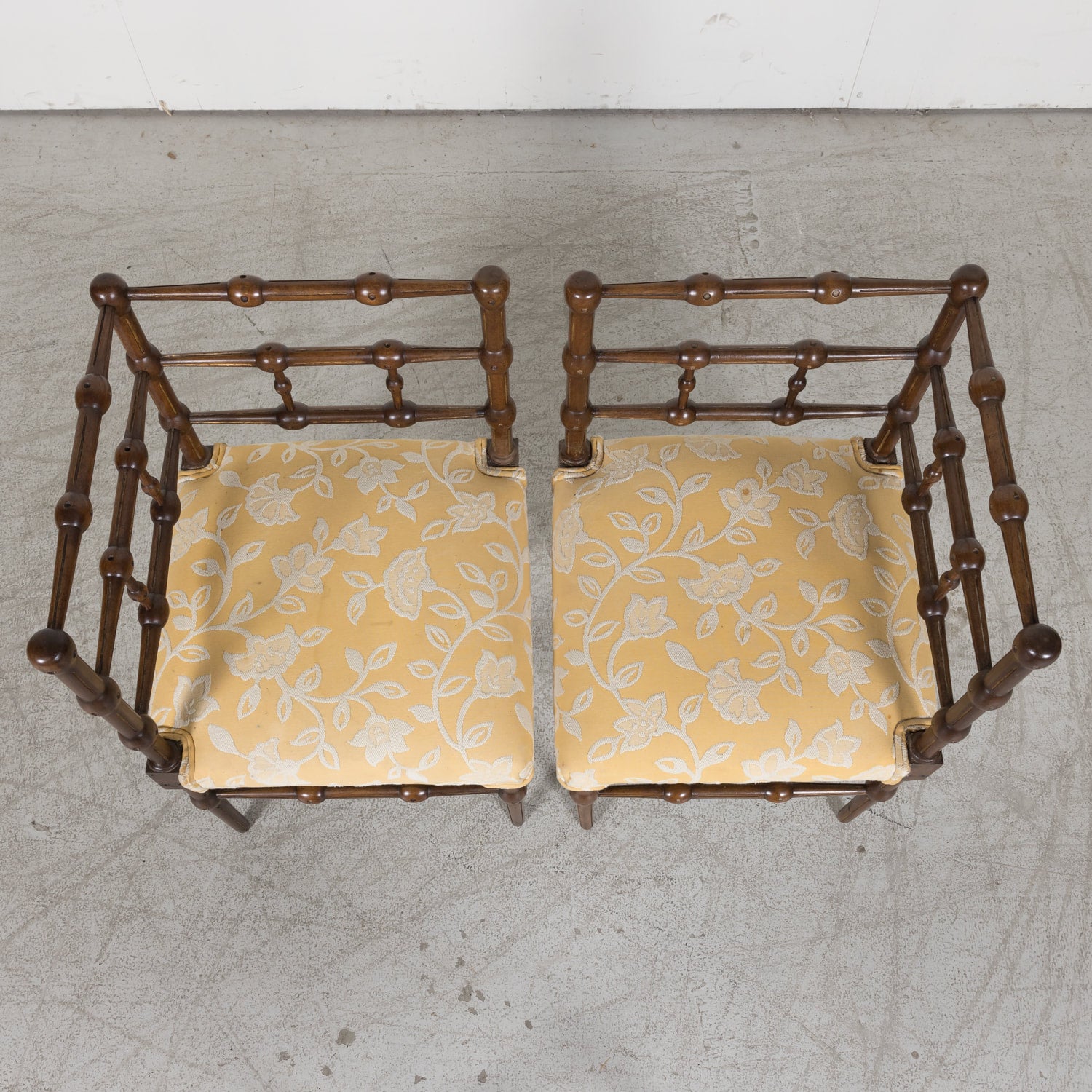 Pair of faux bamboo corner chairs from Normandie