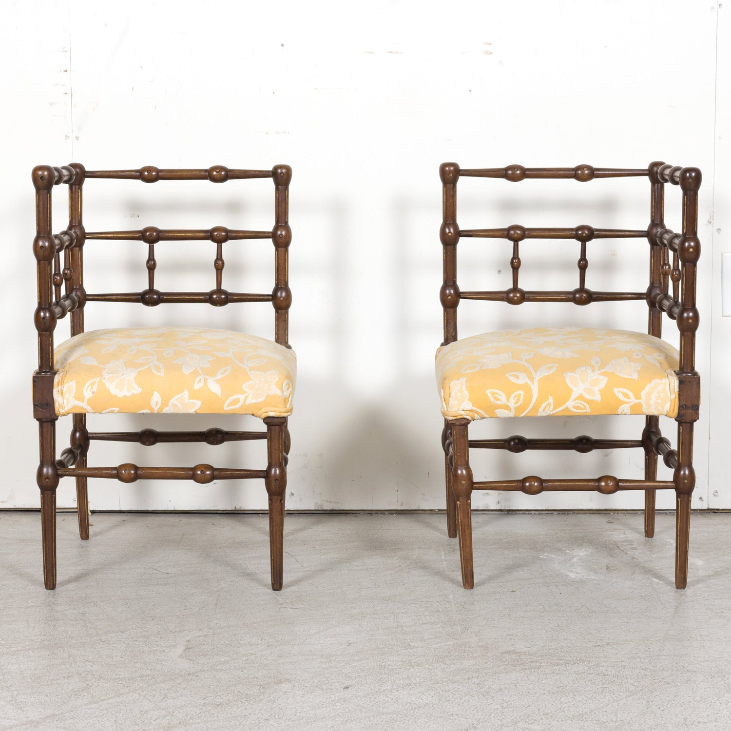 Pair of faux bamboo corner chairs from Normandie