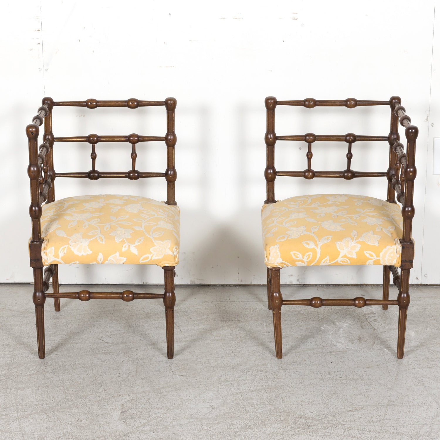 Pair of faux bamboo corner chairs from Normandie
