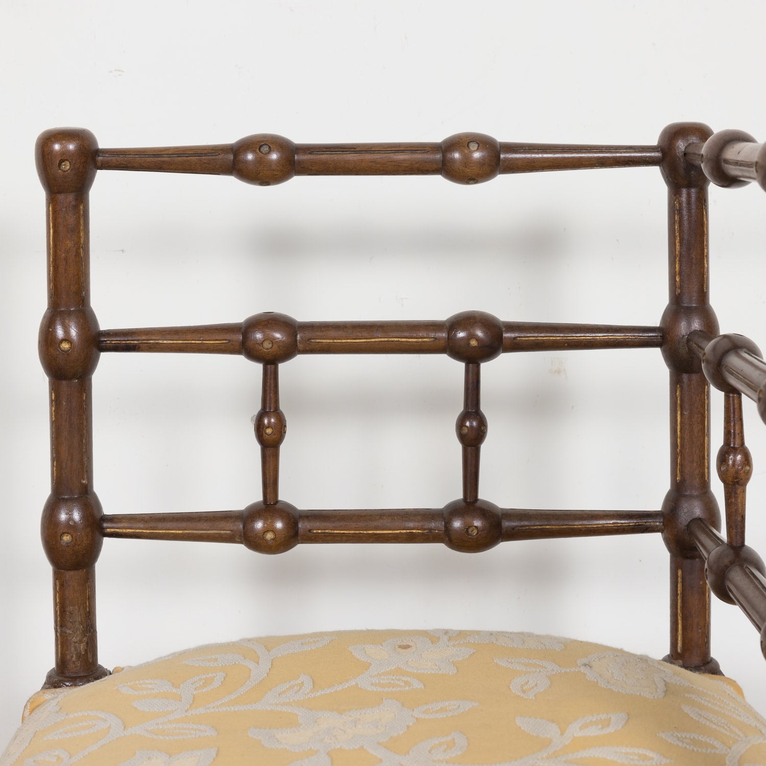 Pair of faux bamboo corner chairs from Normandie