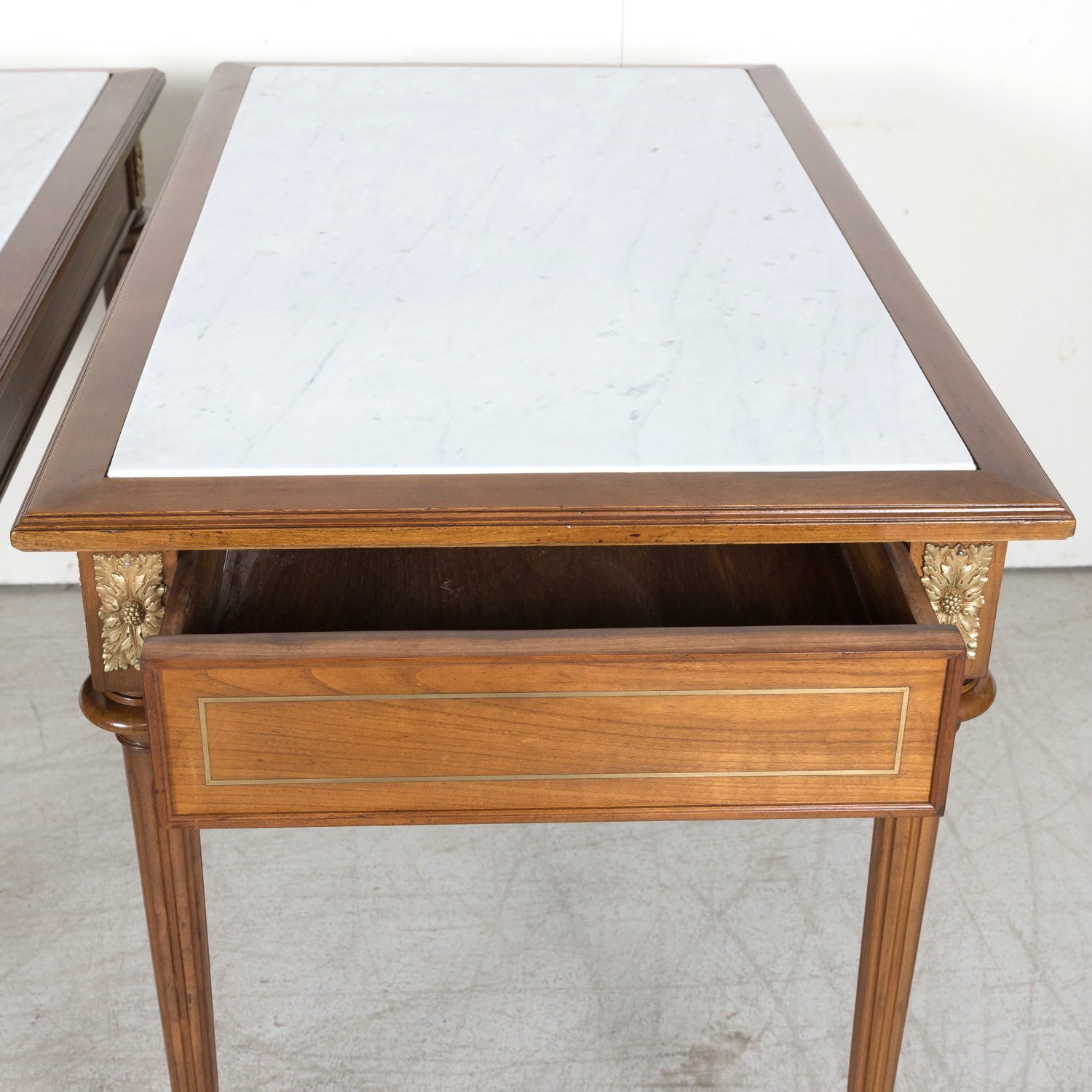 Pair of Early 20th Century French Louis XVI Style Maison Jansen Cherry Console Tables or Side Tables with Carrara Marble Tops and Drawers